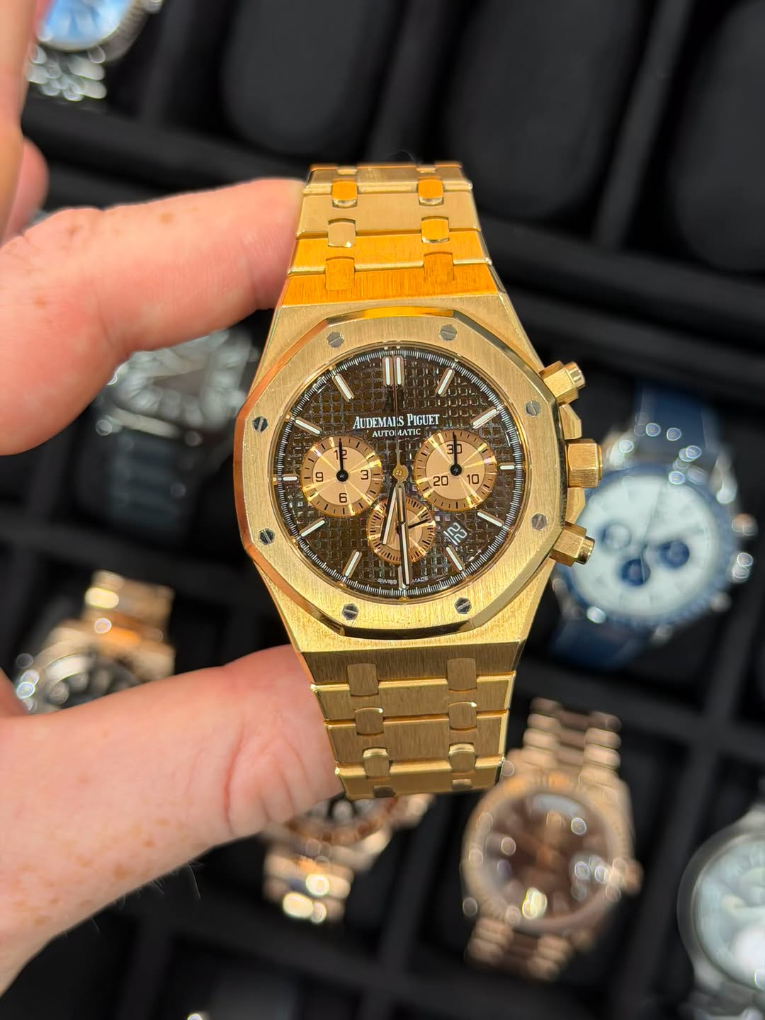 May be an image of wrist watch and text