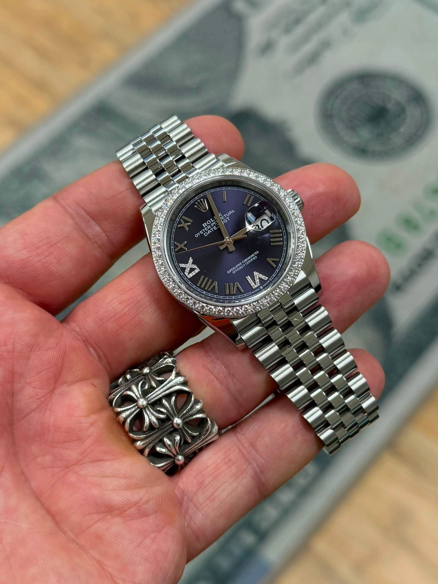May be an image of wrist watch and text