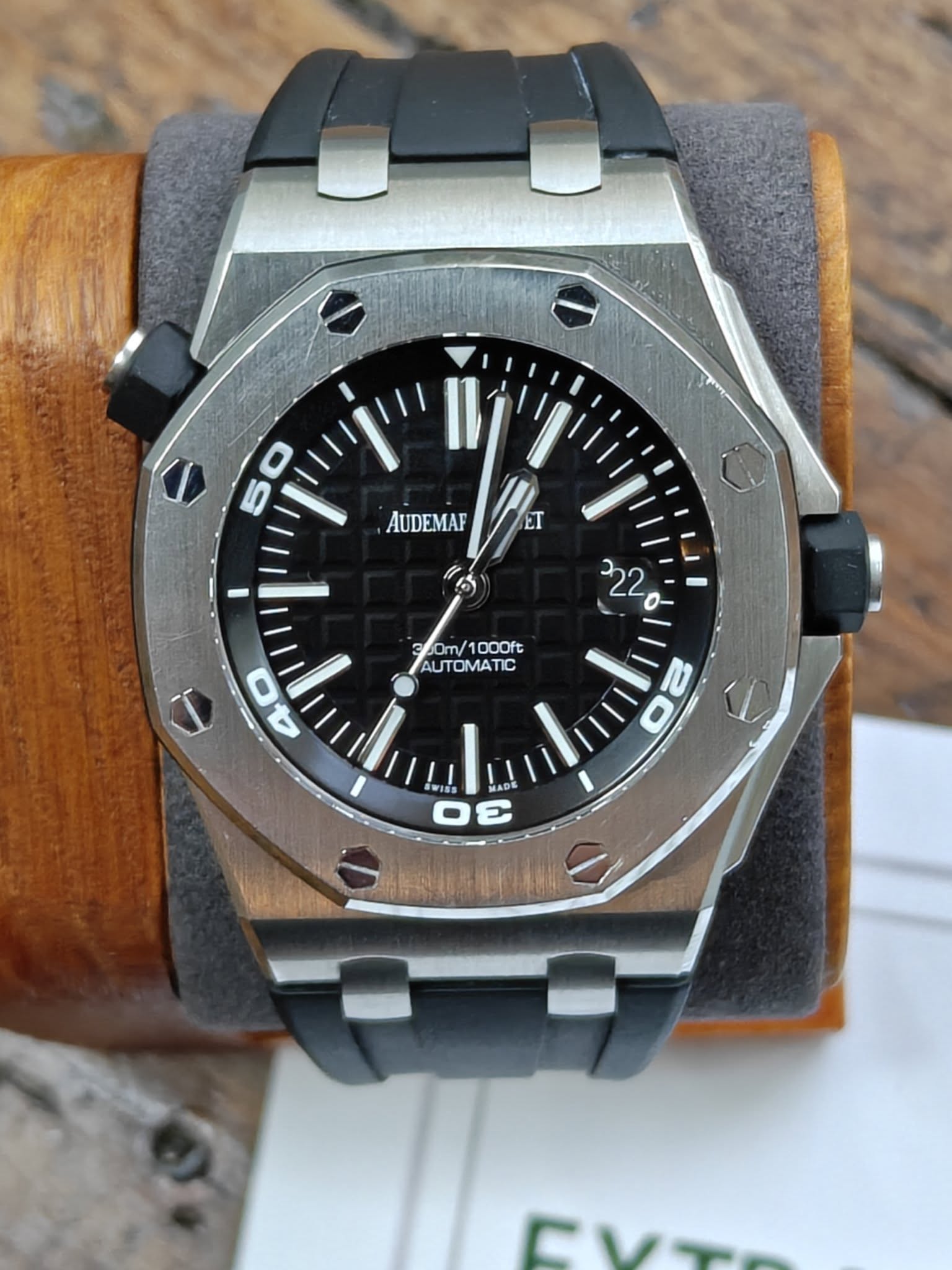 May be an image of wrist watch and text