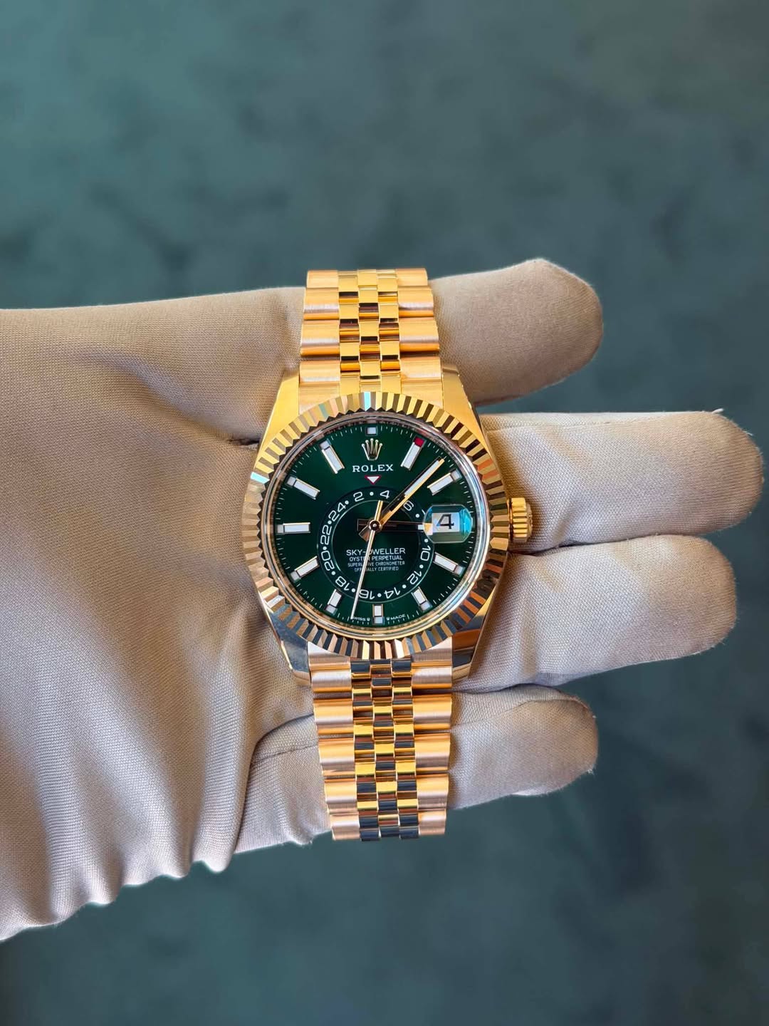 May be an image of wrist watch and text that says 'RO ROLEX EX 2 2 2 D ELLER 0 ה MIIIIII レ 96'