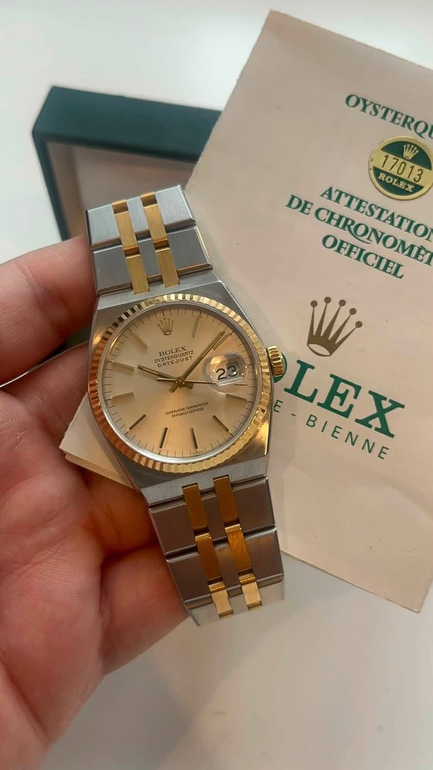 May be an image of wrist watch and text