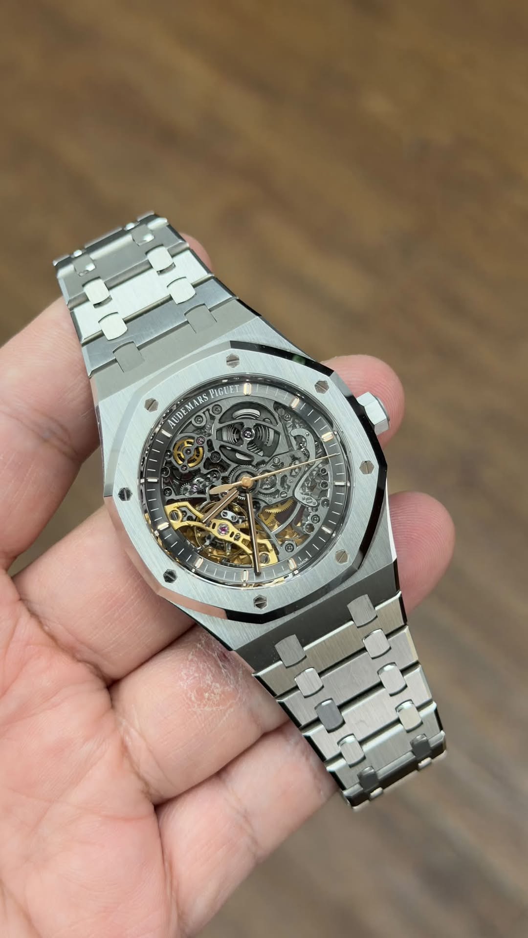 May be an image of wrist watch and text