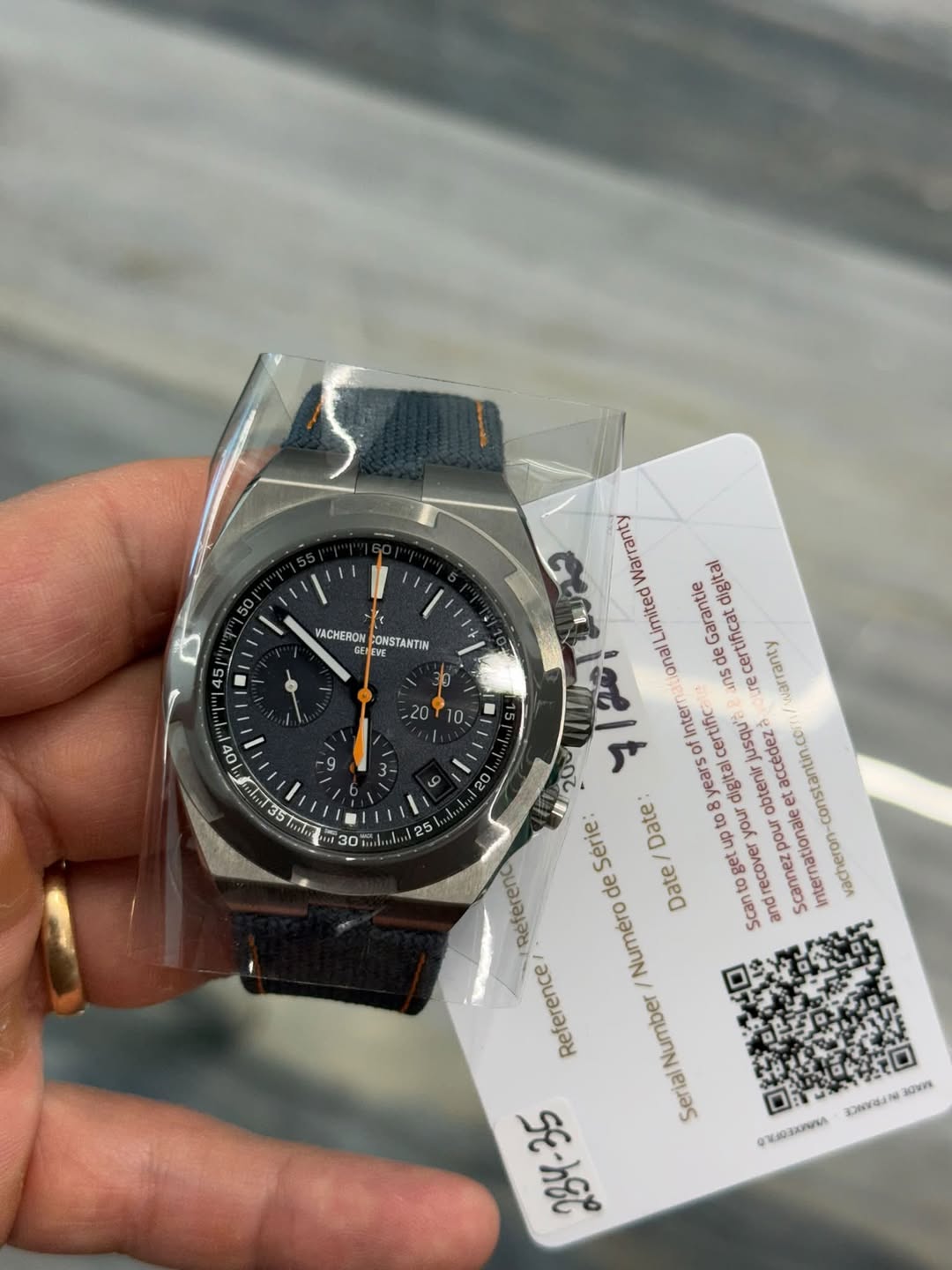 May be an image of wrist watch and text