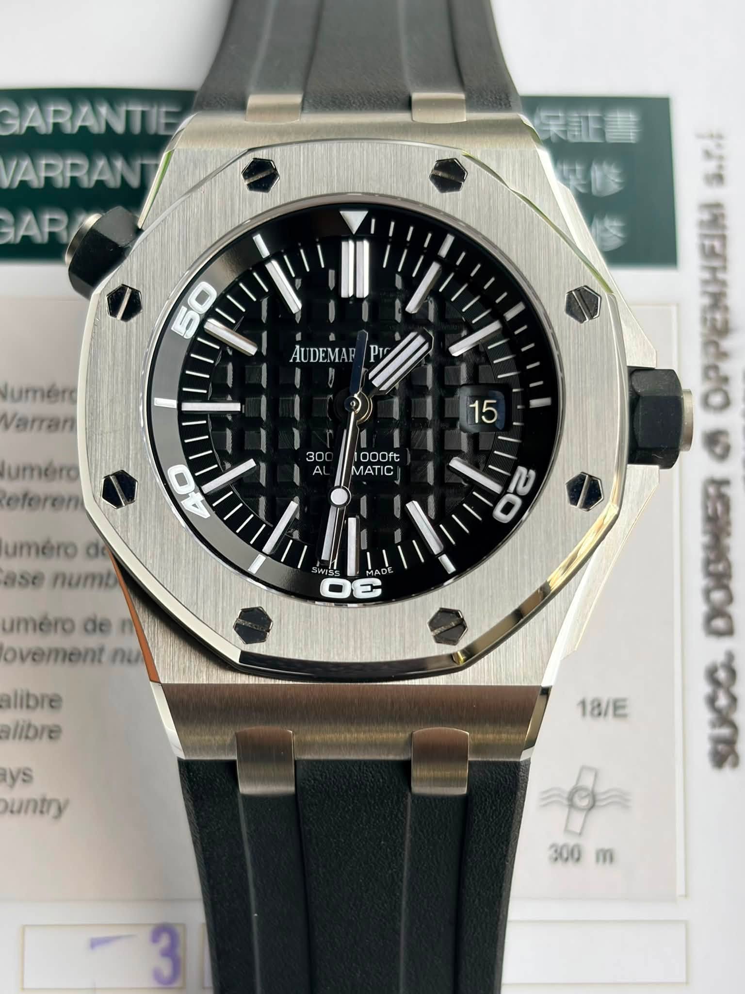 May be an image of wrist watch and text that says 'GARANTIE VARRAN AR/ 保証書 umérs Varran AUDEMAR AUDEMAP P1 uméra eferem 30 15 OOOft MATIC C M산 uméro de ase numb 20 uméro umérode de…