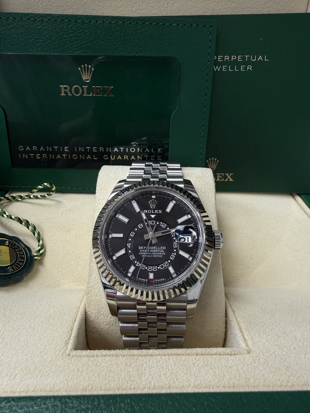 May be an image of wrist watch and text