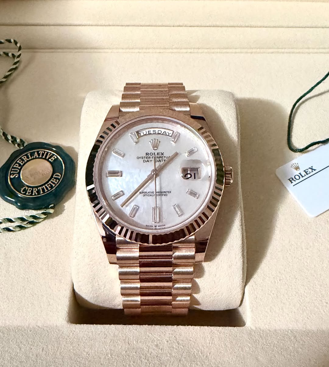 May be an image of wrist watch and text
