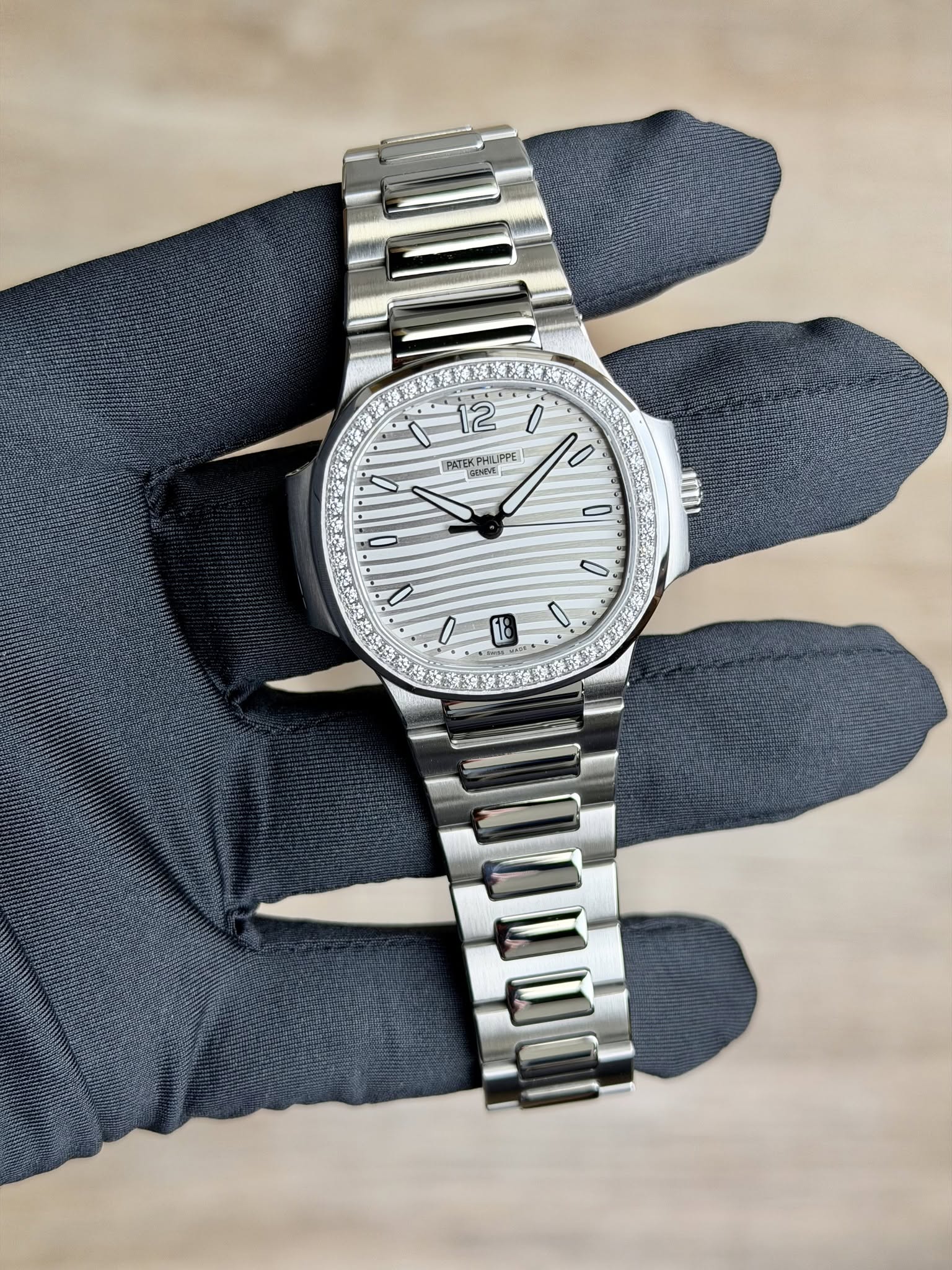May be an image of wrist watch and text