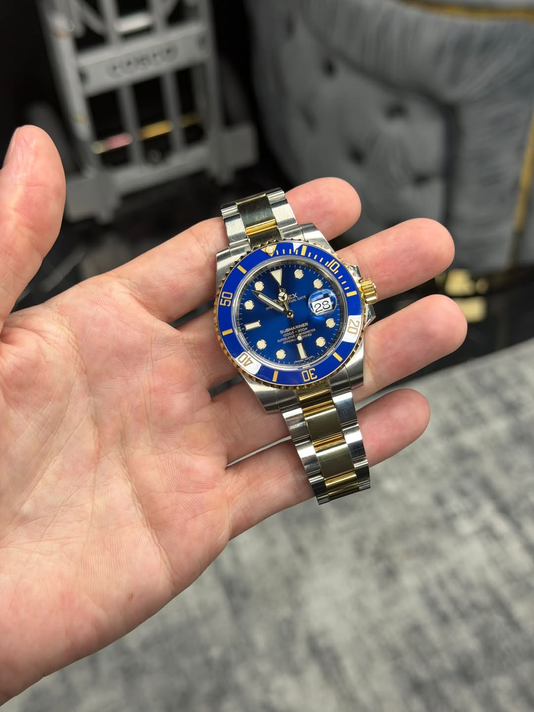 May be an image of wrist watch and text
