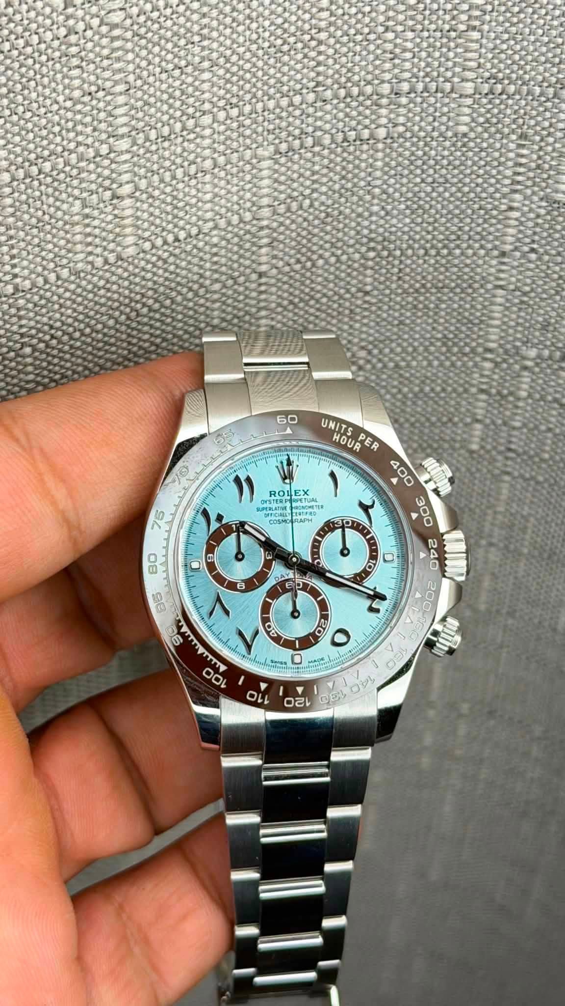 May be an image of wrist watch and text