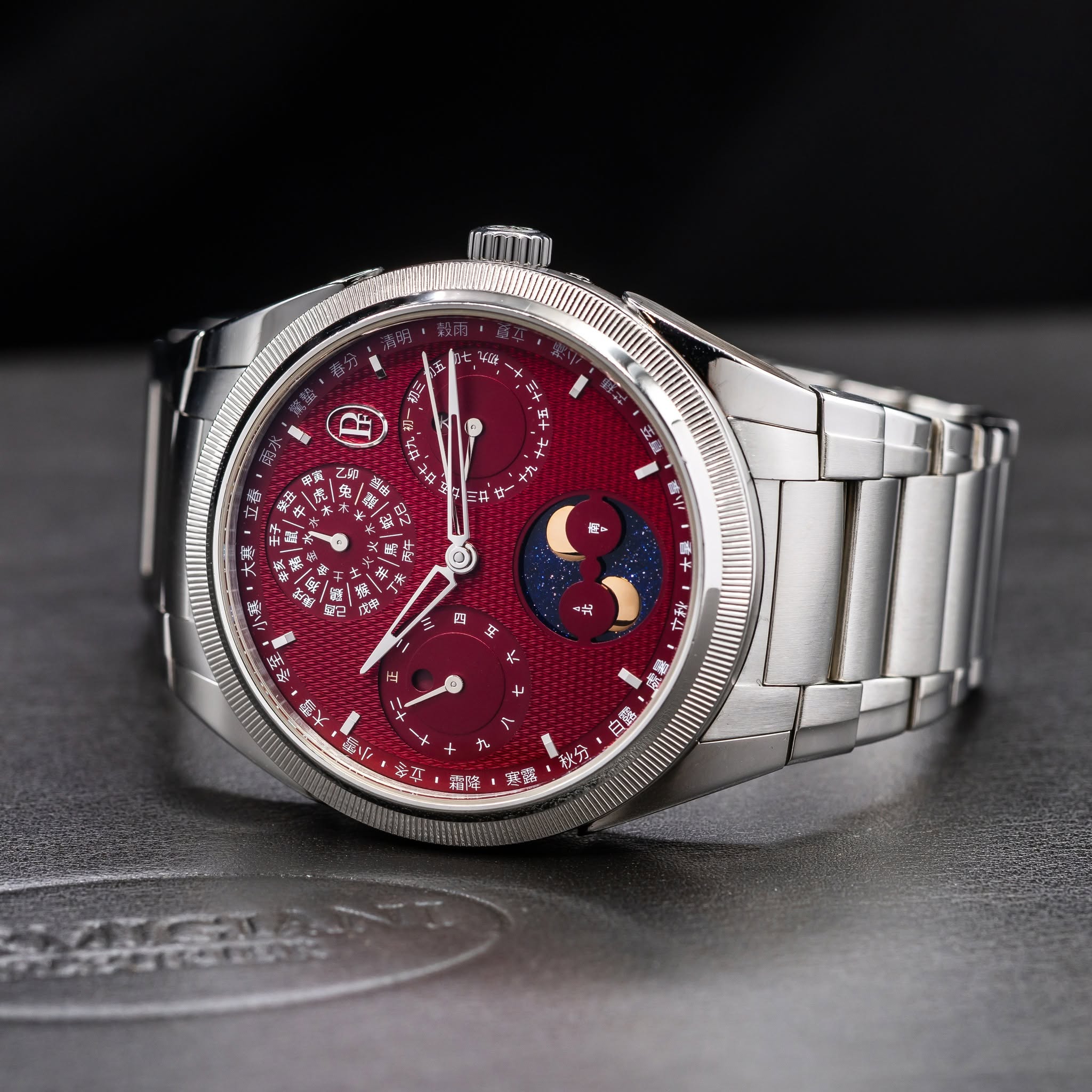 May be an image of wrist watch and text