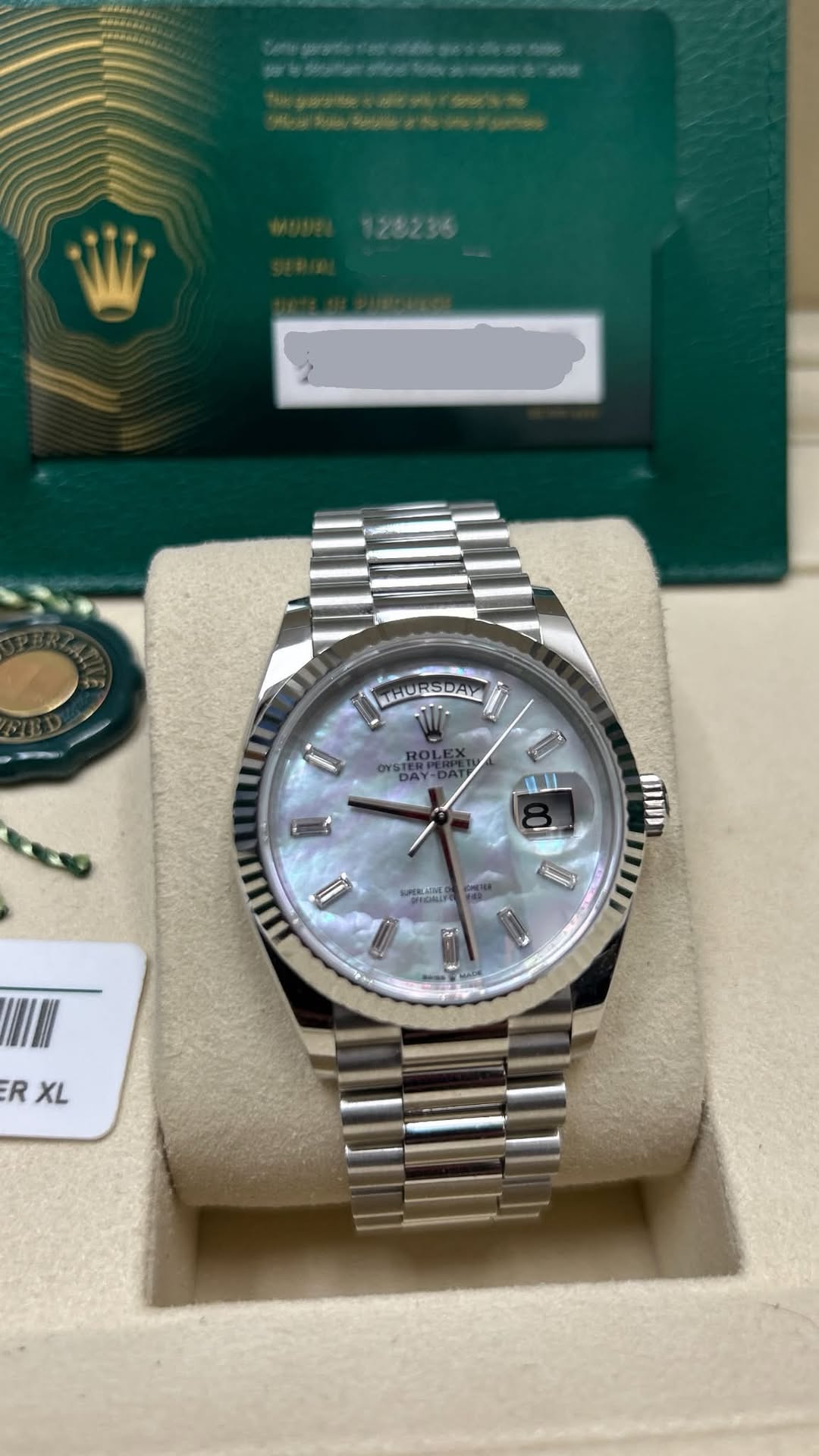 May be an image of wrist watch and text
