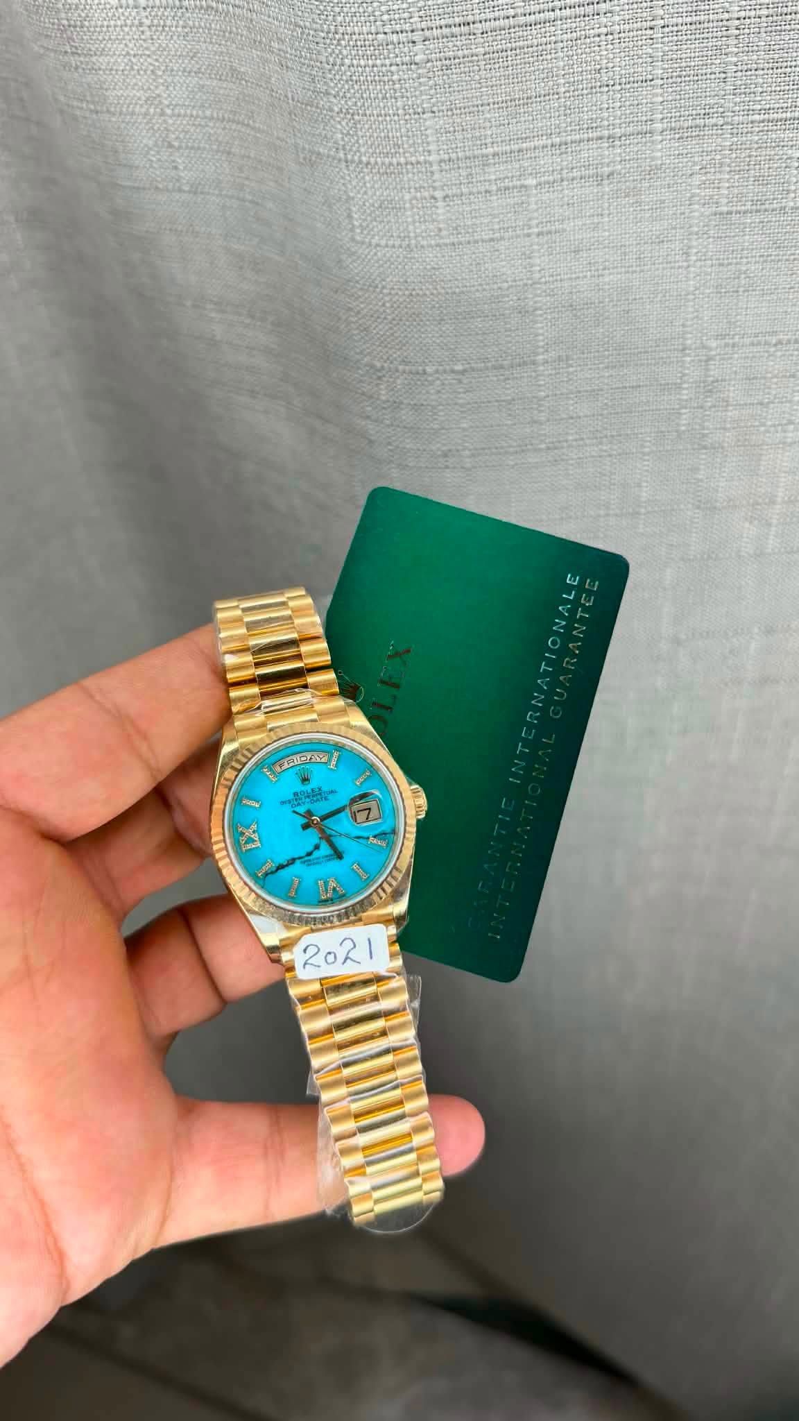 May be an image of wrist watch and text