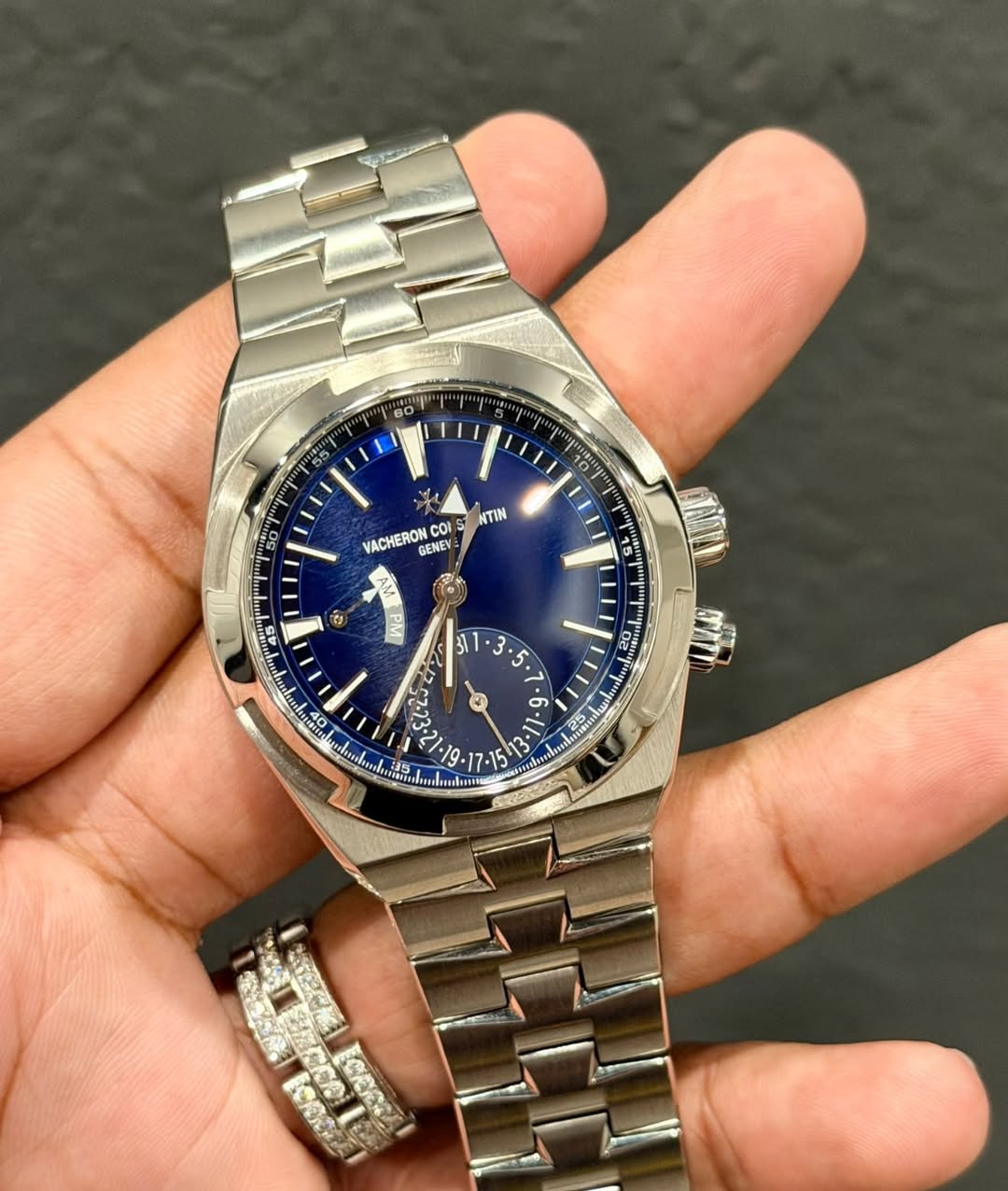 May be an image of wrist watch and text