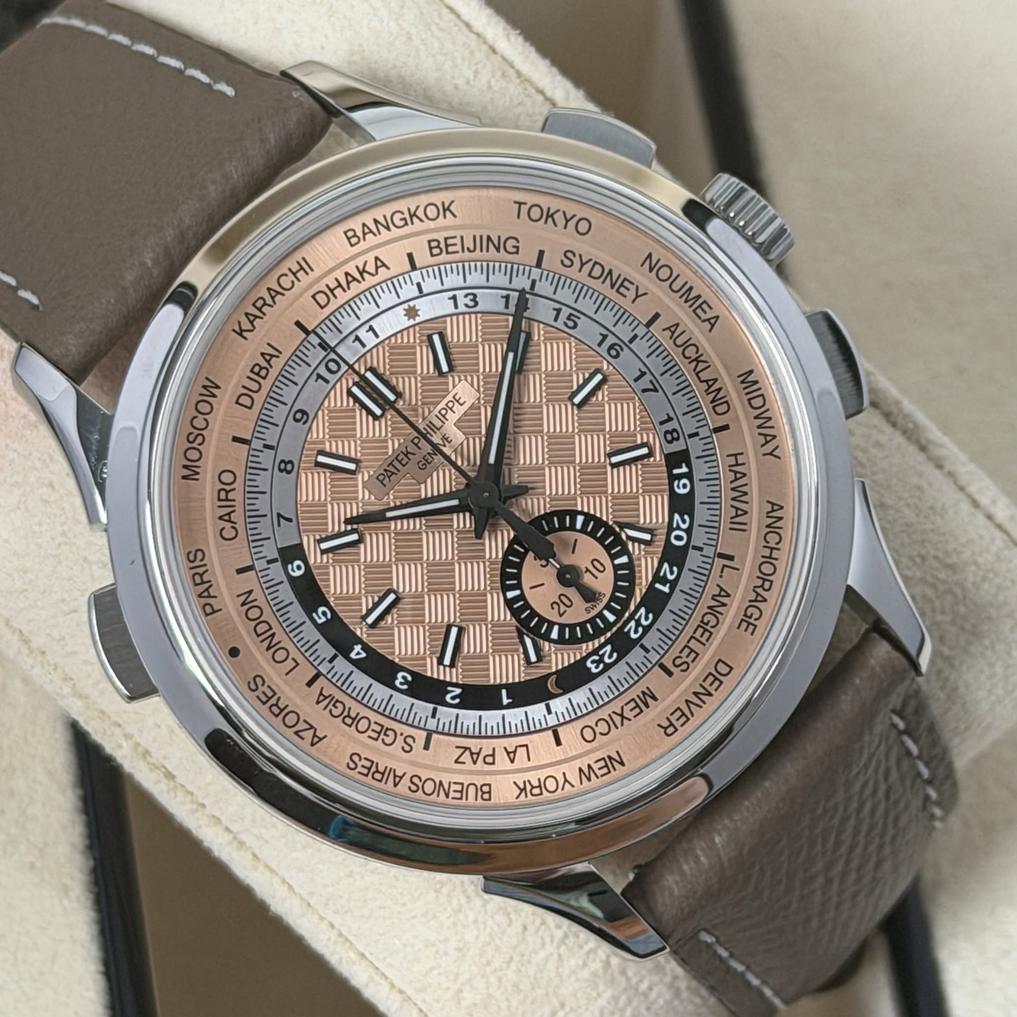 May be an image of wrist watch and text