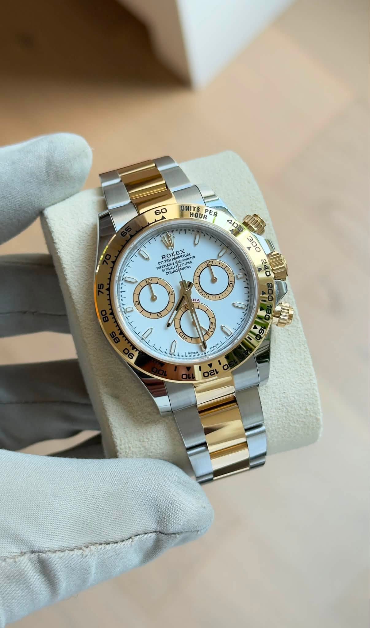 May be an image of wrist watch and text
