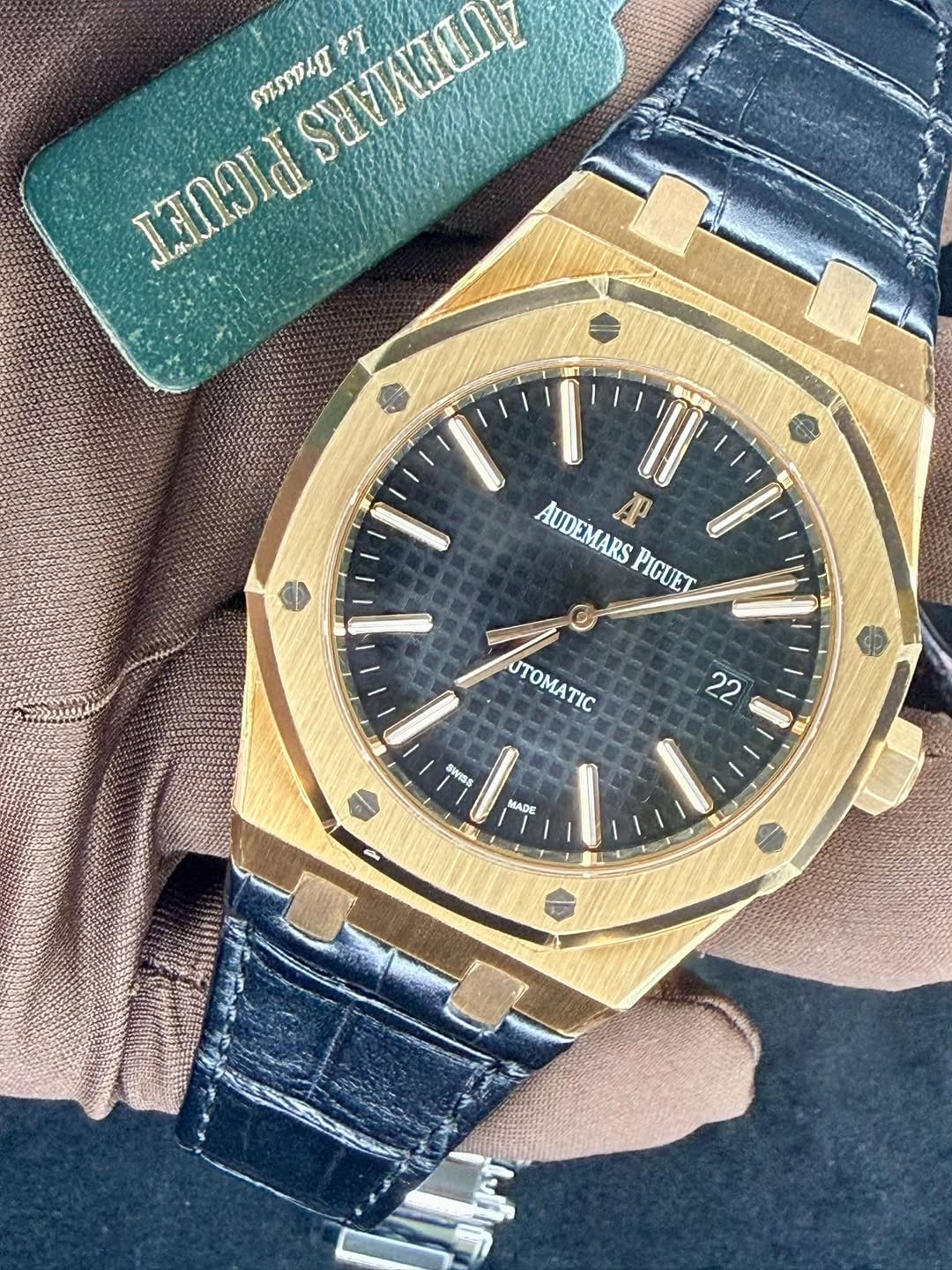 May be an image of wrist watch and text