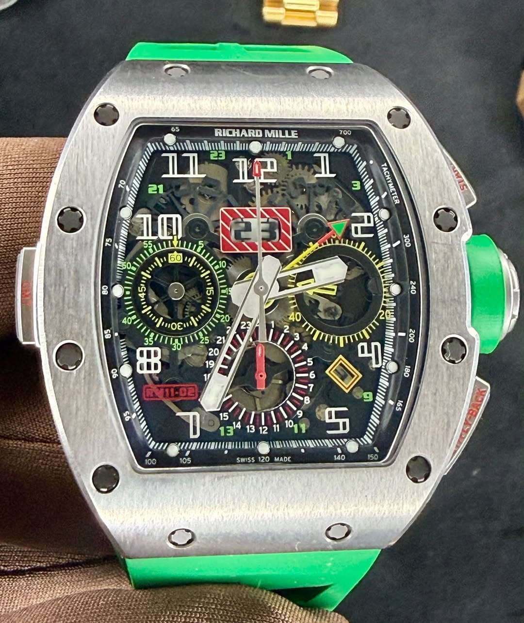 May be an image of wrist watch and text