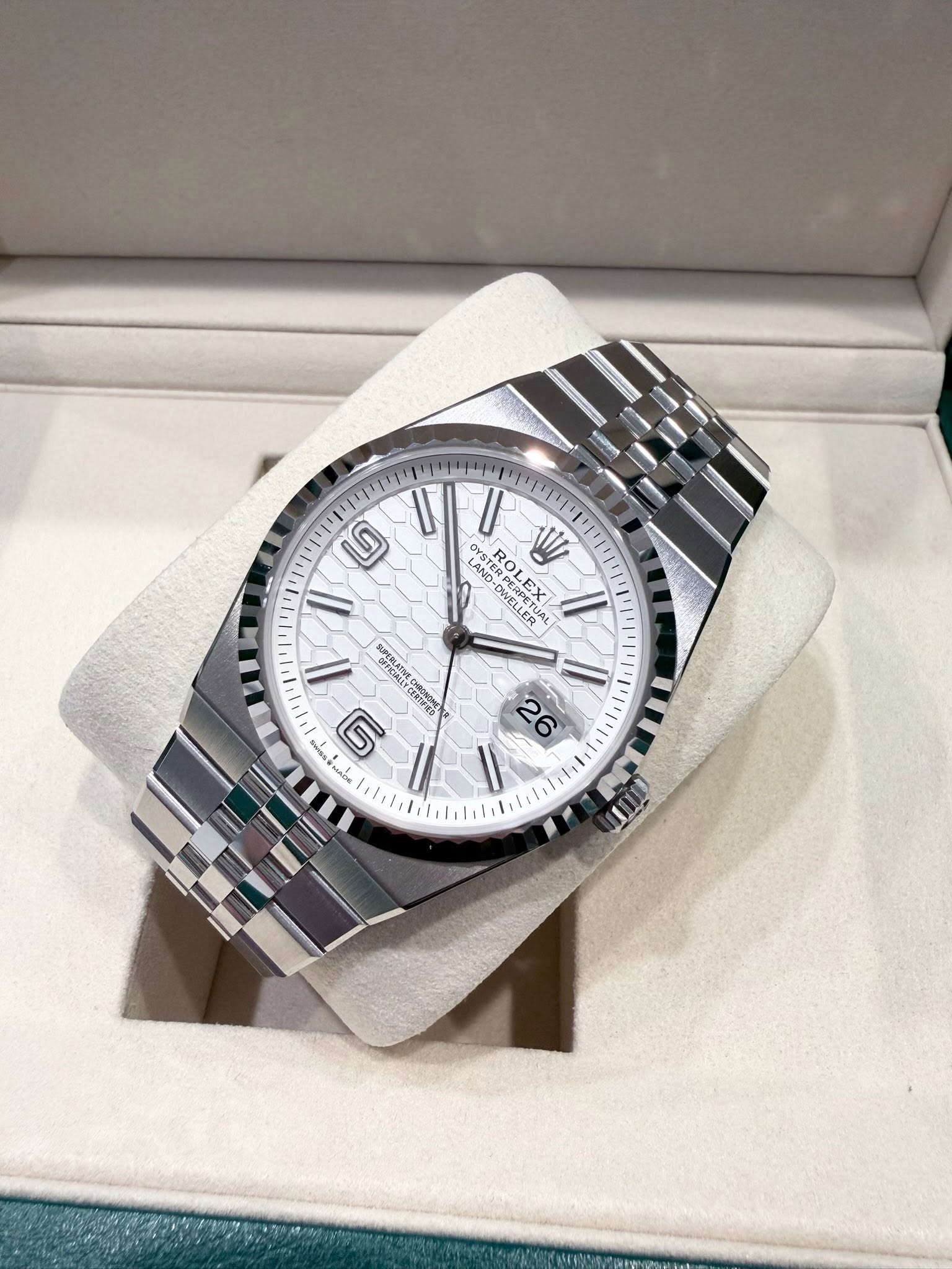 May be an image of wrist watch and text