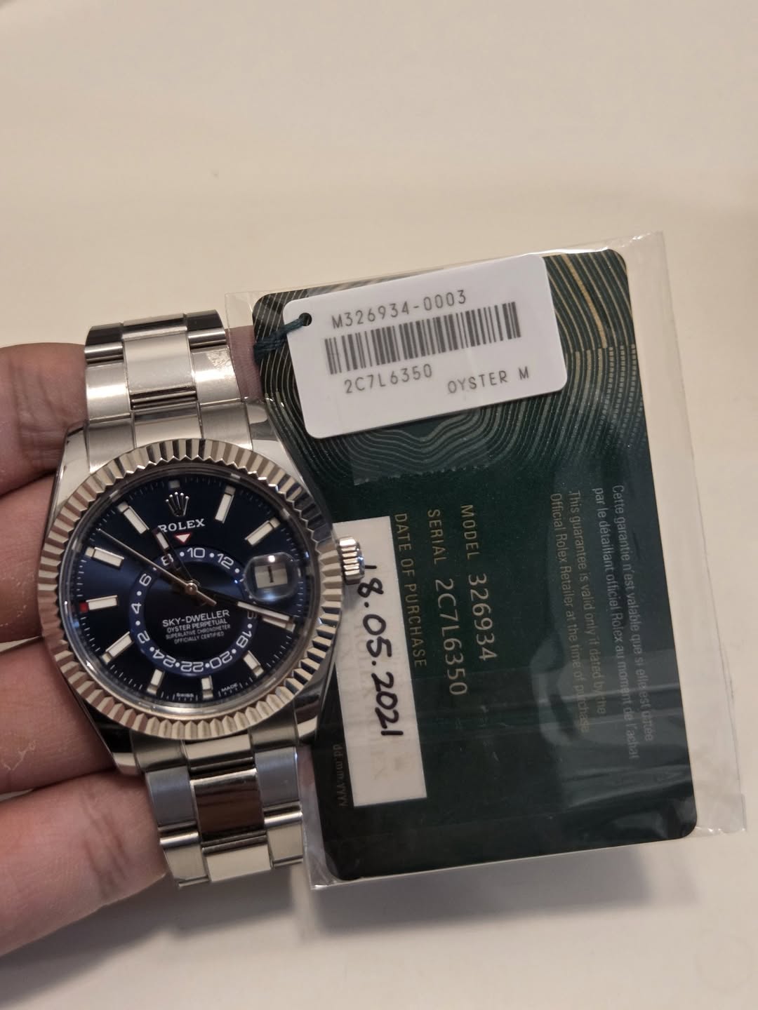 May be an image of wrist watch and text that says 'M326934-0 M326934- 2C7L6350 6350 OYSTER M ROLEX DWEL ه DU 18 ٧ 22 n tU 22 ល i 0 m m18. '