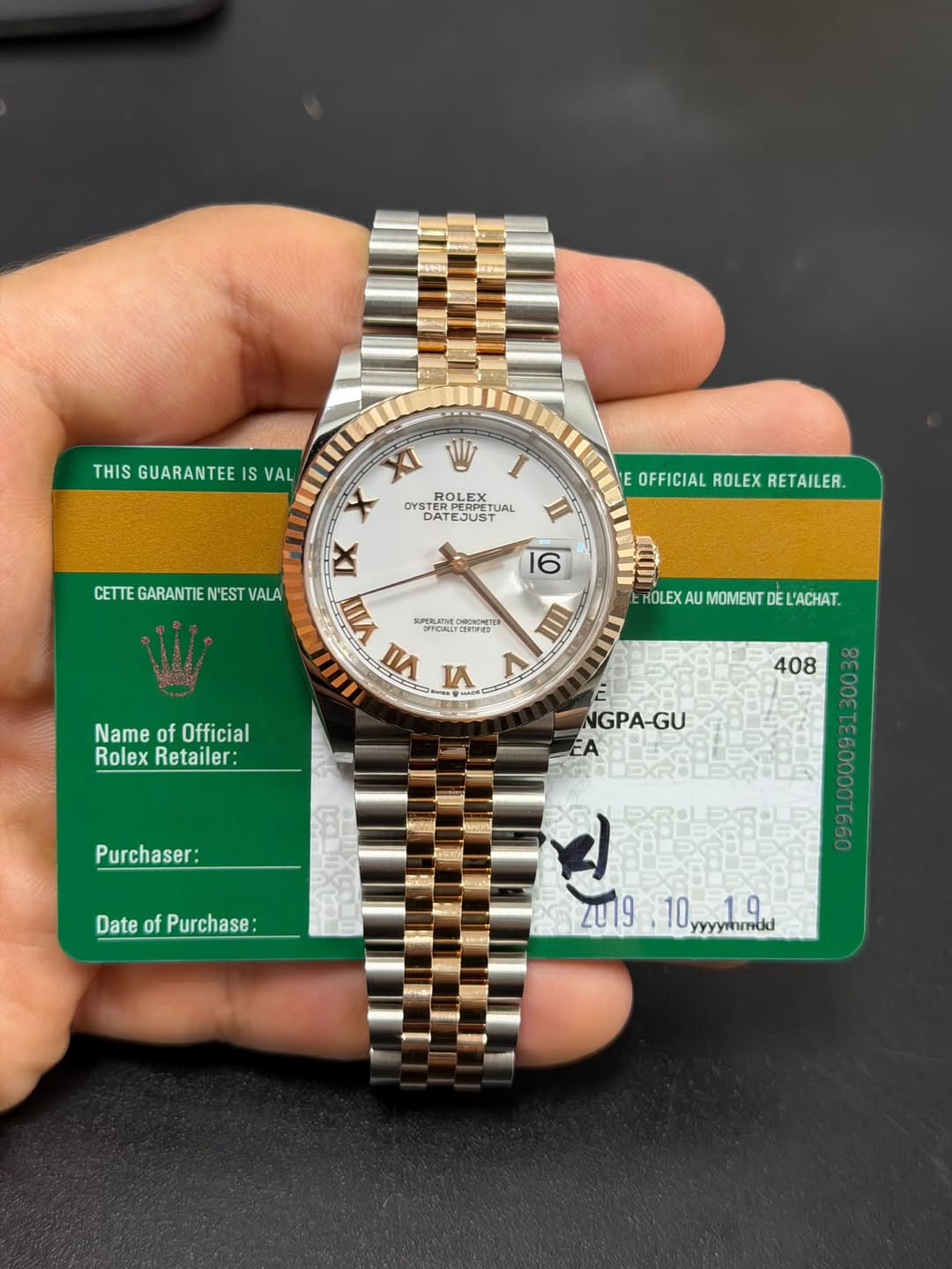 May be an image of wrist watch and text that says 'THIS GUARANTEE THISGUARANTEEISVAL IS VAL XI W OYSTE YSTERPERPE ROLEX PERPETU ERPET ROL EX DATEJUST TUAL Σιοι…