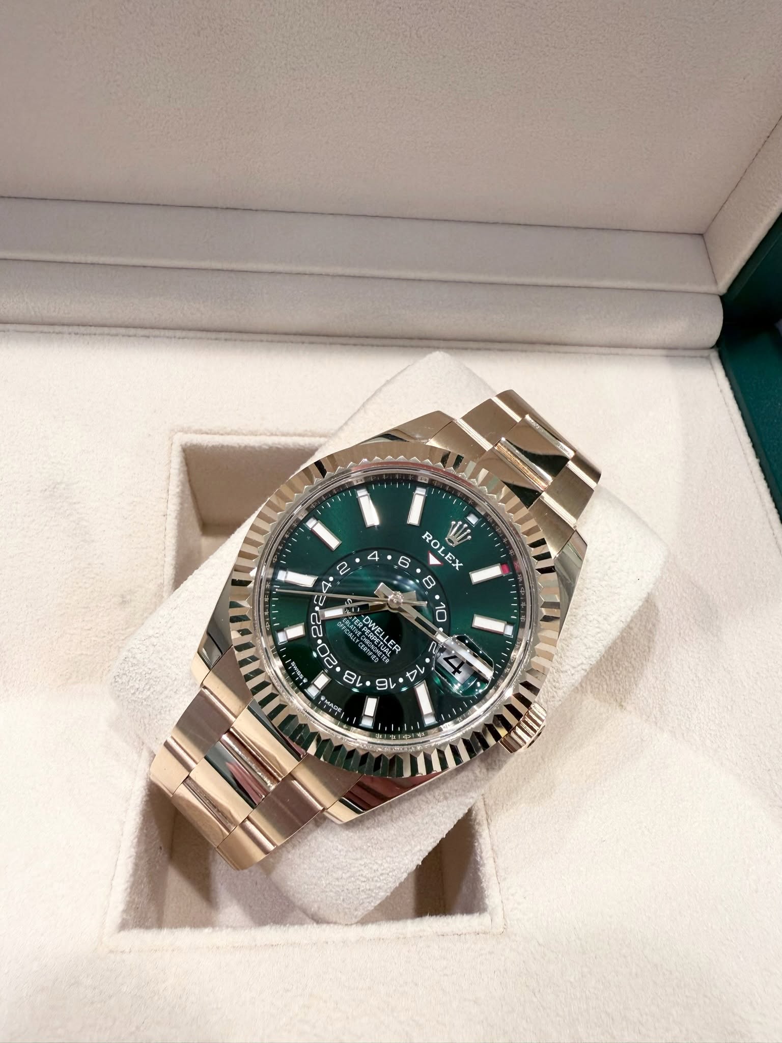 May be an image of wrist watch and text