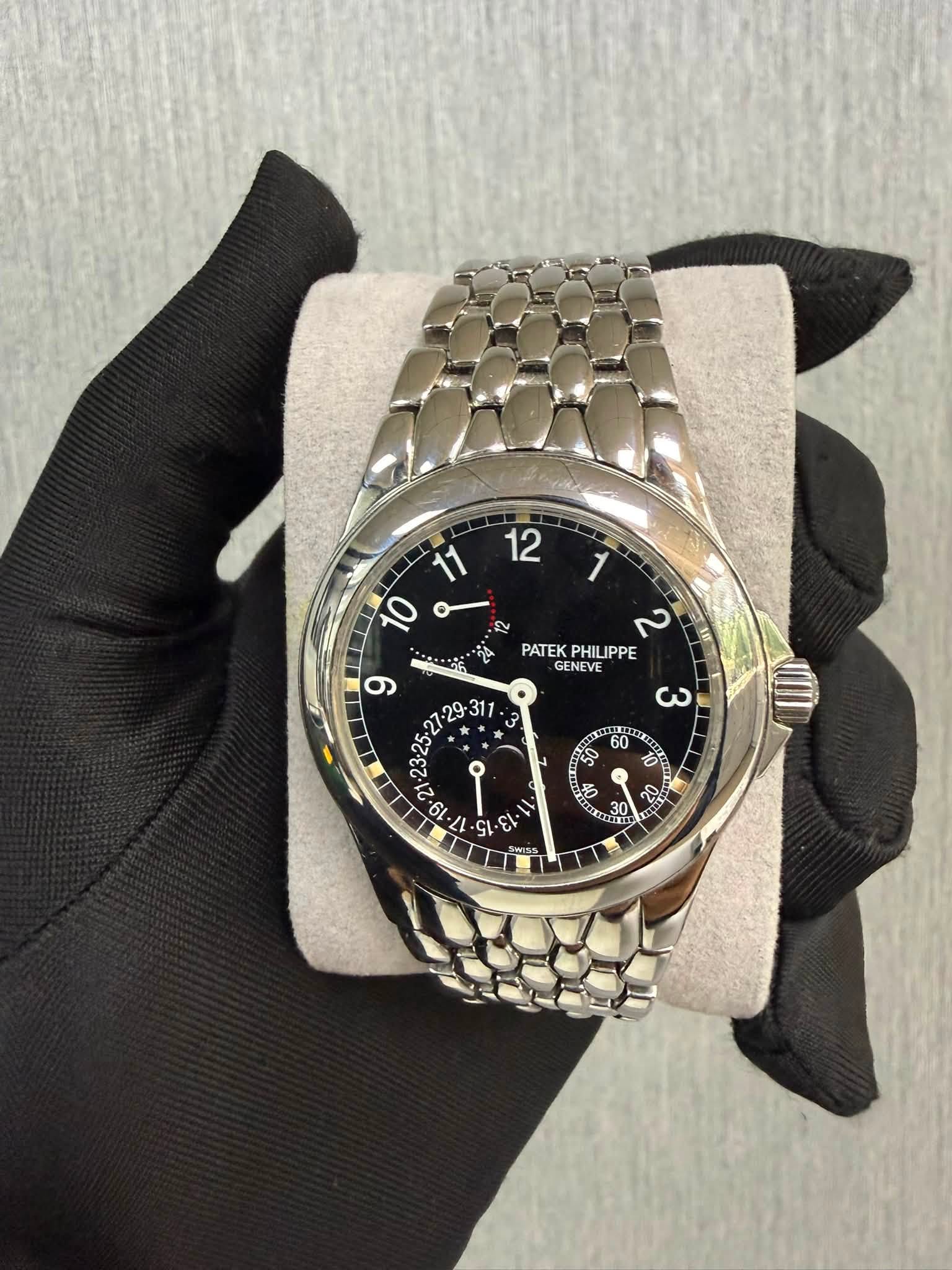 May be an image of wrist watch and text that says '12 11 10 a 1 ឆ 2 ရပ် PATEKPHILIPPE PATEK PHILIPPE GENEVE ک X ه 6 o ના., الرن ει El ဝု 50 60 I 0 ジ D'