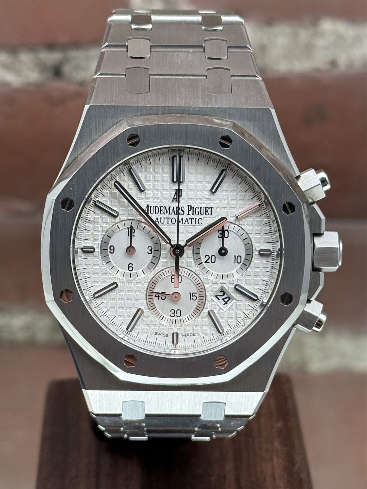 May be an image of wrist watch and text