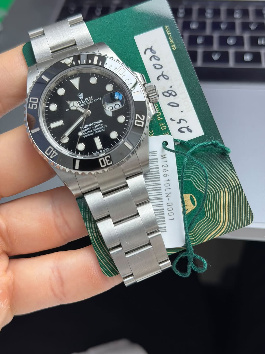 May be an image of wrist watch and text