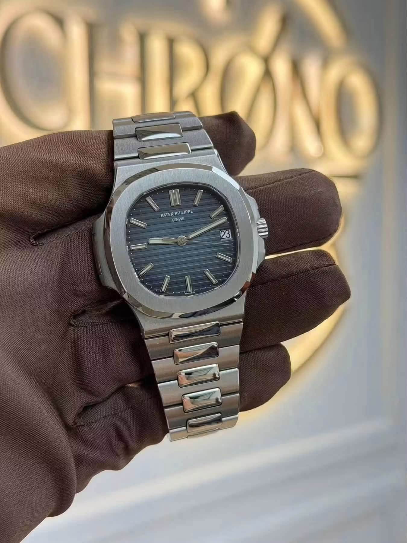May be an image of wrist watch and text that says 'PATEK PHL ATEKPHILIPP PHIL IPPE ENEVE 23 I'