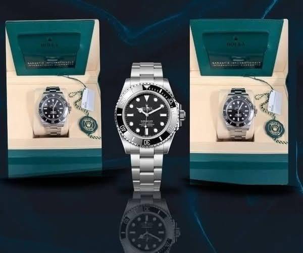 May be an image of wrist watch and text that says '40 LIUI II 20 ΟE TR'