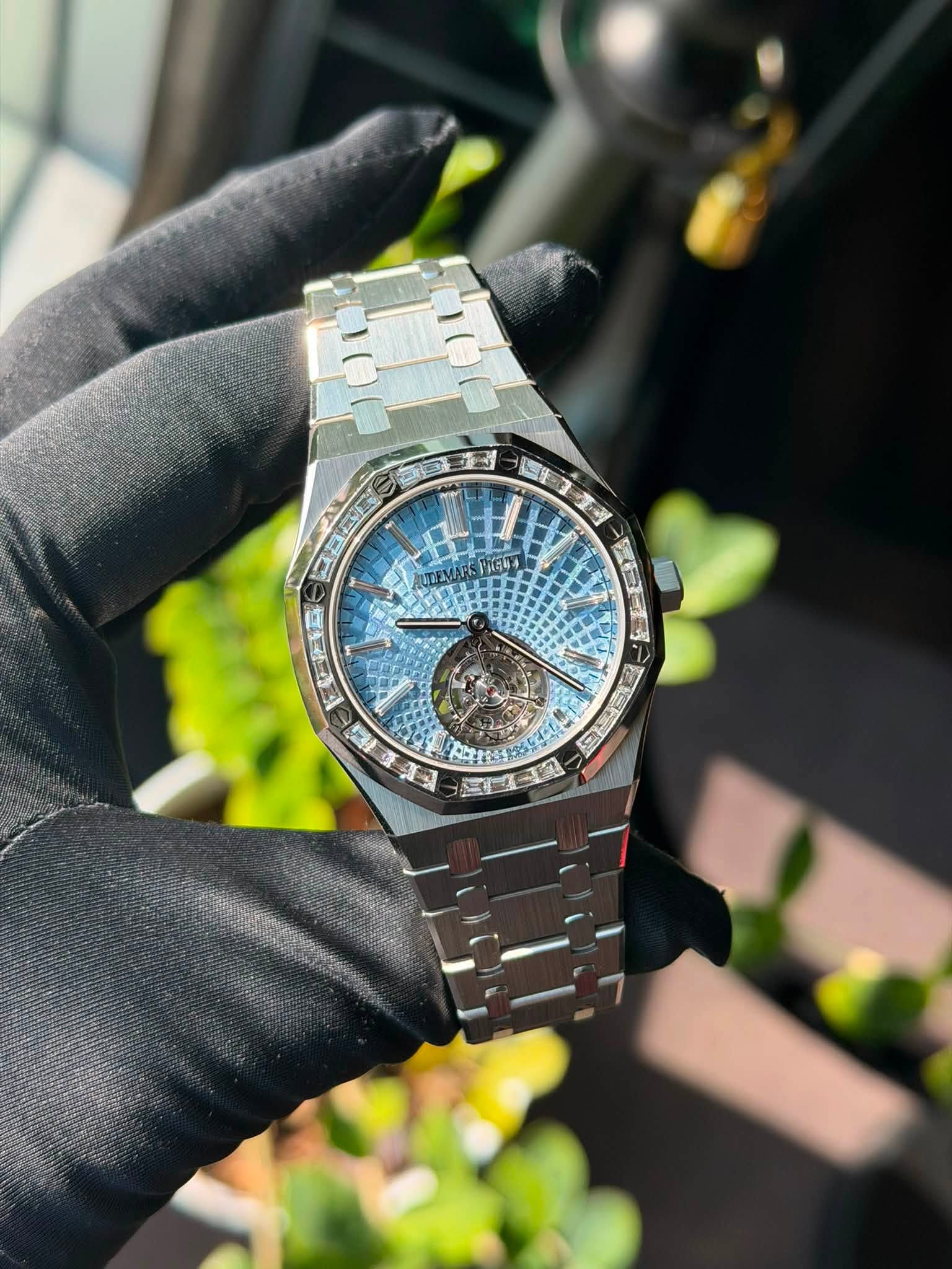 May be an image of wrist watch and text