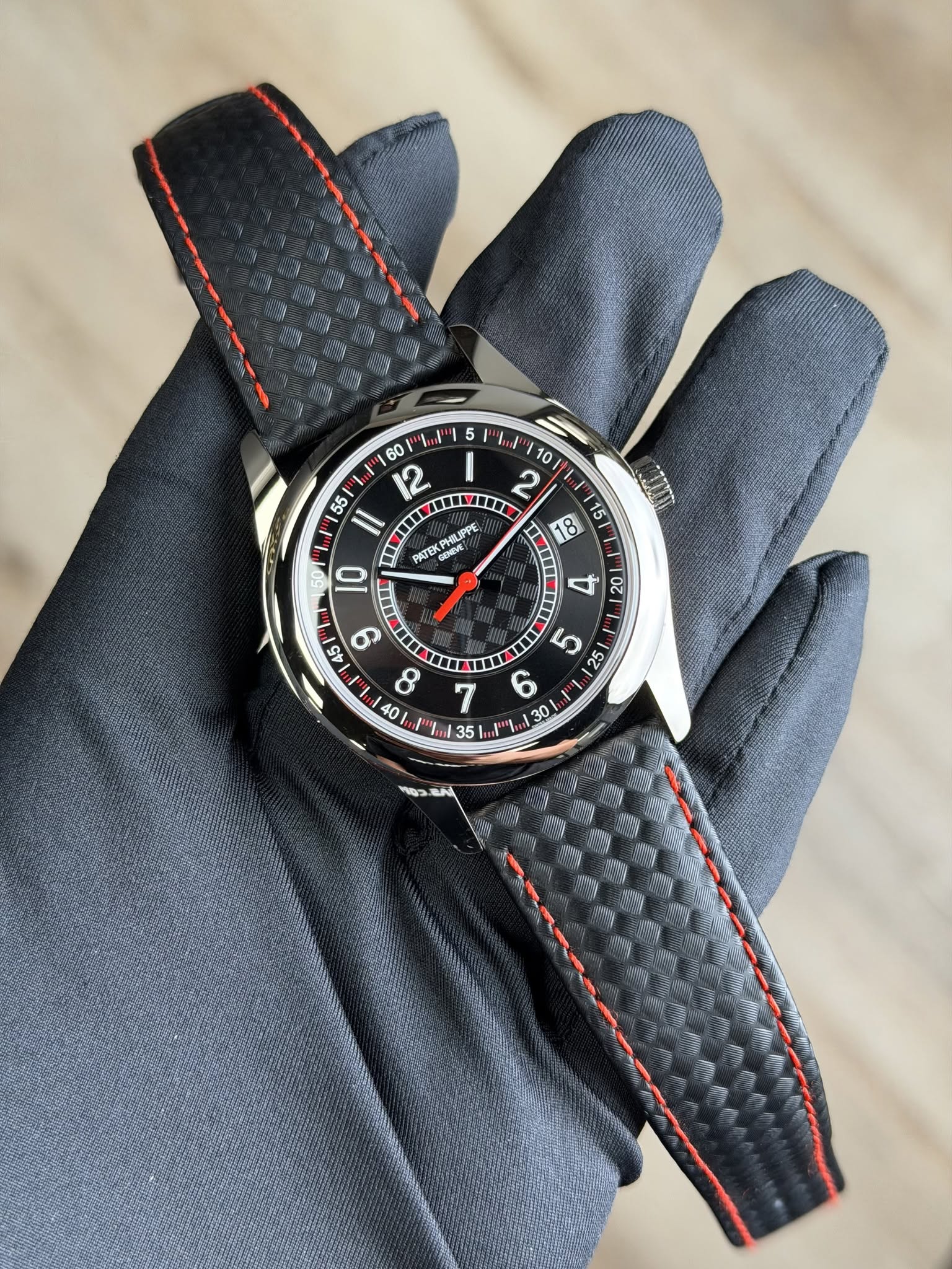 May be an image of wrist watch and text
