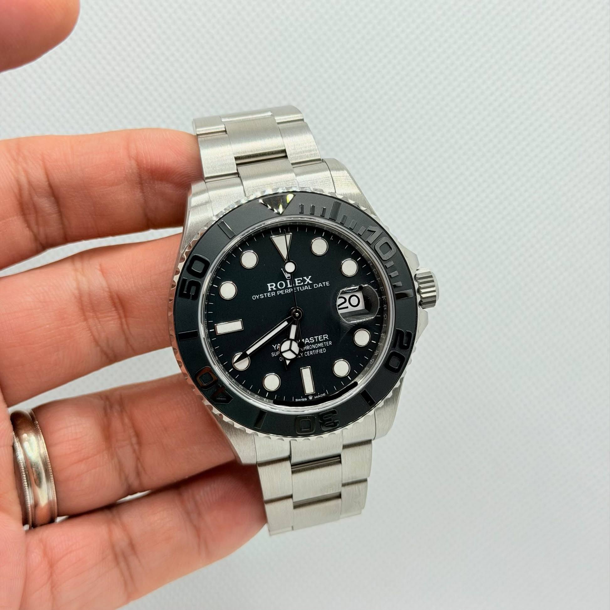 May be an image of wrist watch and text