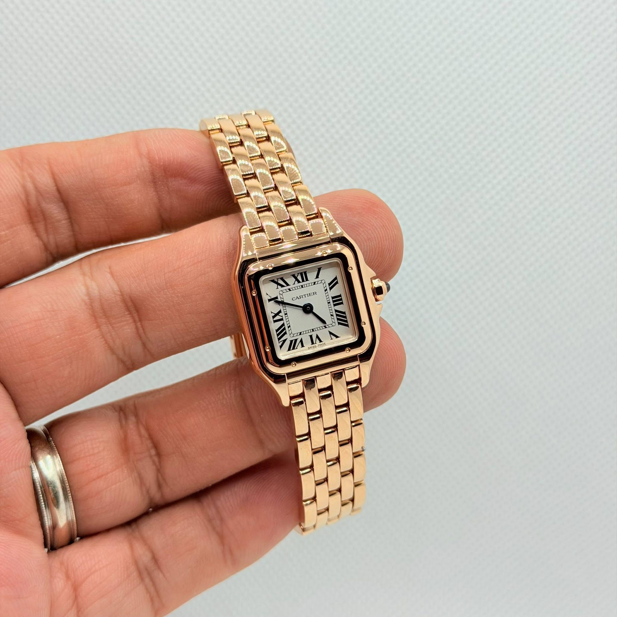 May be an image of digital watch and text
