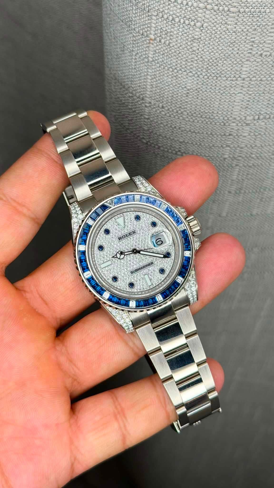 May be an image of wrist watch and text