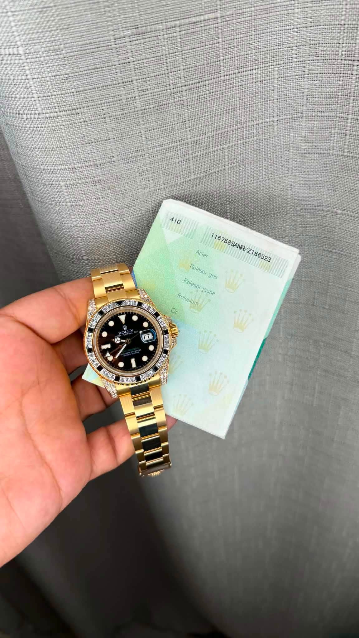 May be an image of wrist watch and text