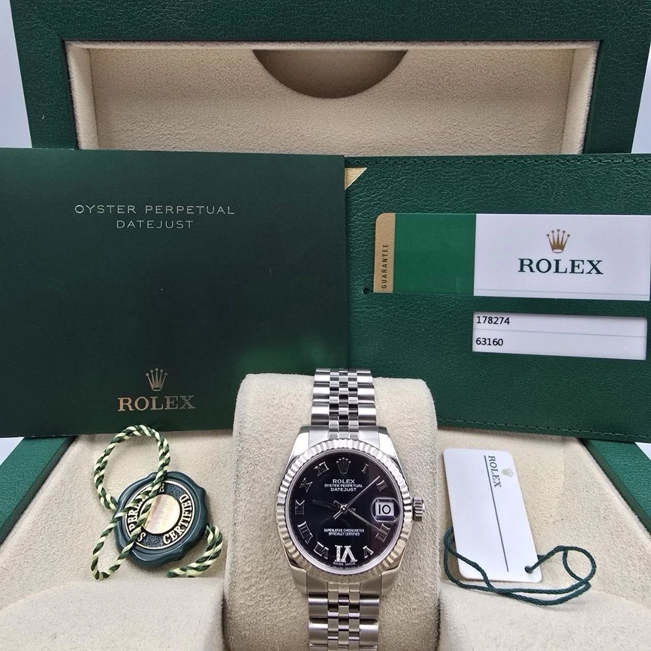 May be an image of wrist watch and text that says 'OYSTER OYSTERPERPETUAL PERPETUAL DATEJUST EJUST GUARANTEE ROLEX 178274 ROL 63160 3 SRIN ROLAT FIB GB ERT ROLEX IO 1 Tm 베년의 。/.…