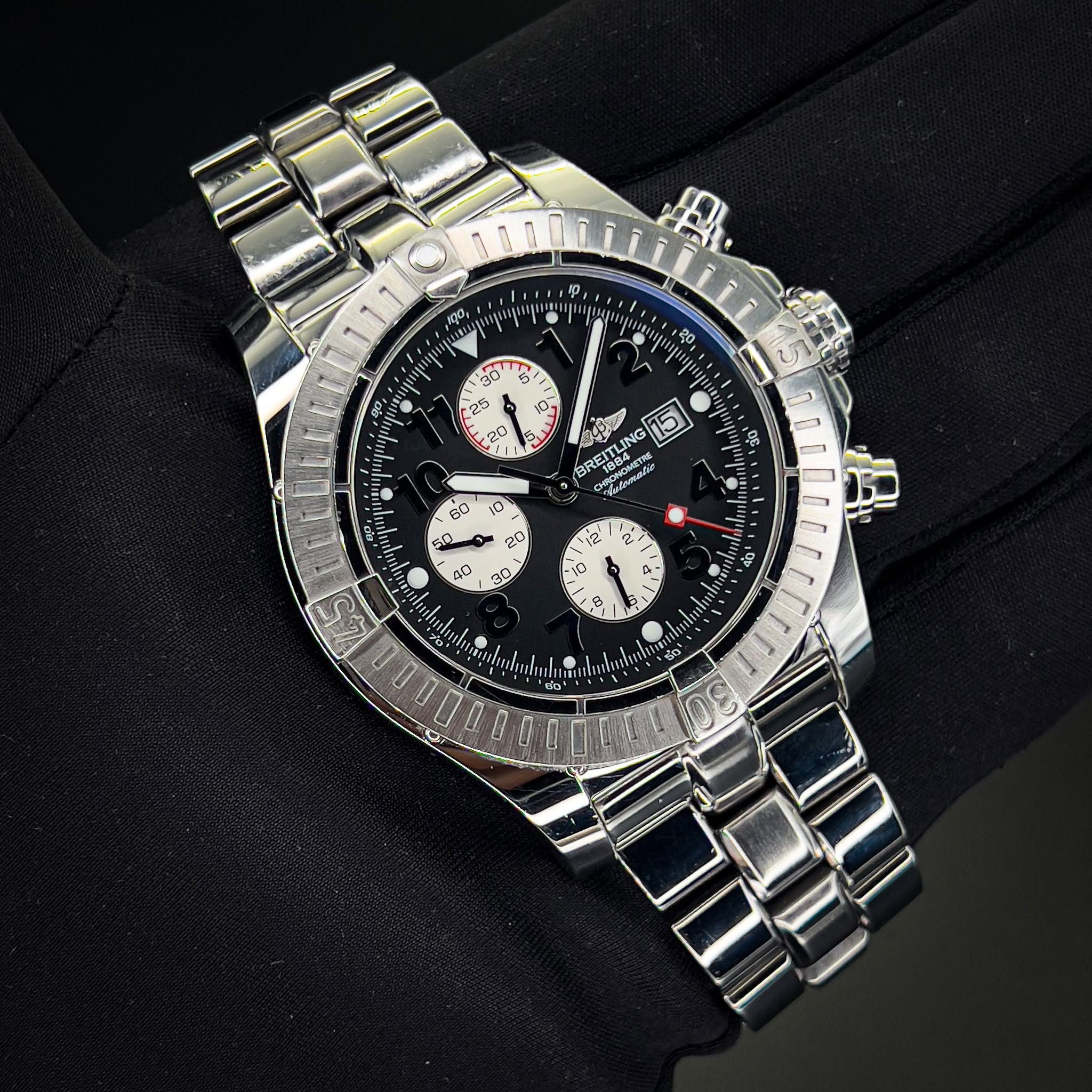 May be an image of wrist watch and text