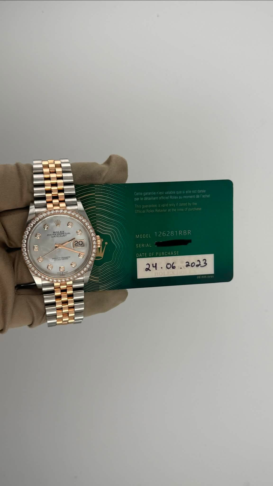 May be an image of wrist watch and text