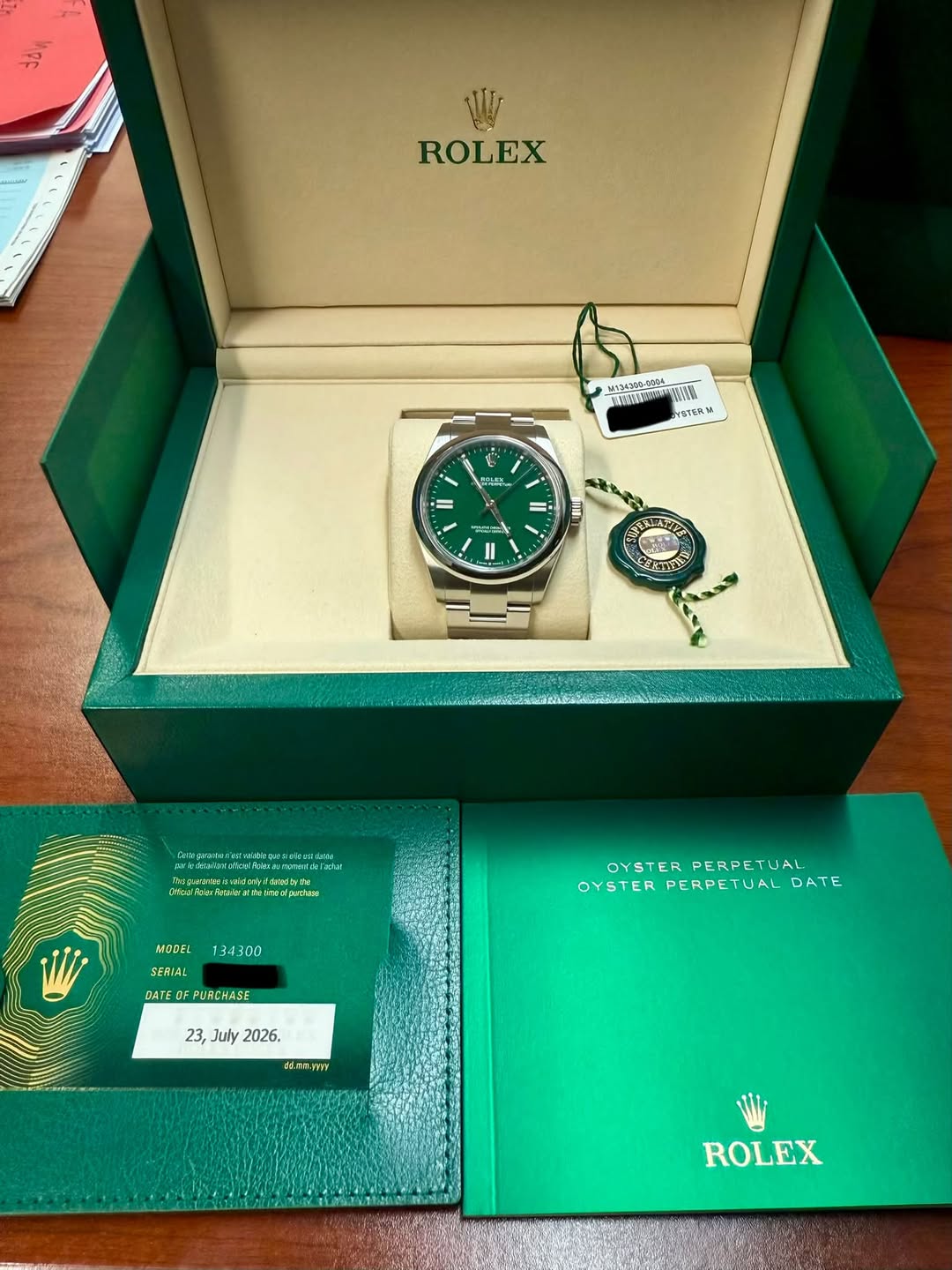 May be an image of wrist watch and text