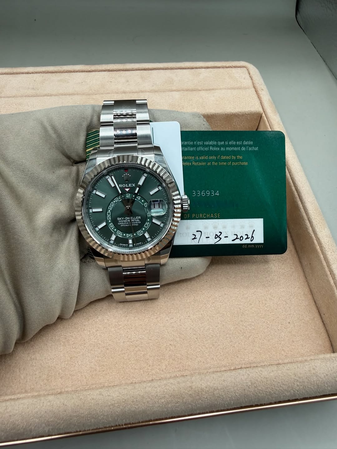 May be an image of wrist watch and text