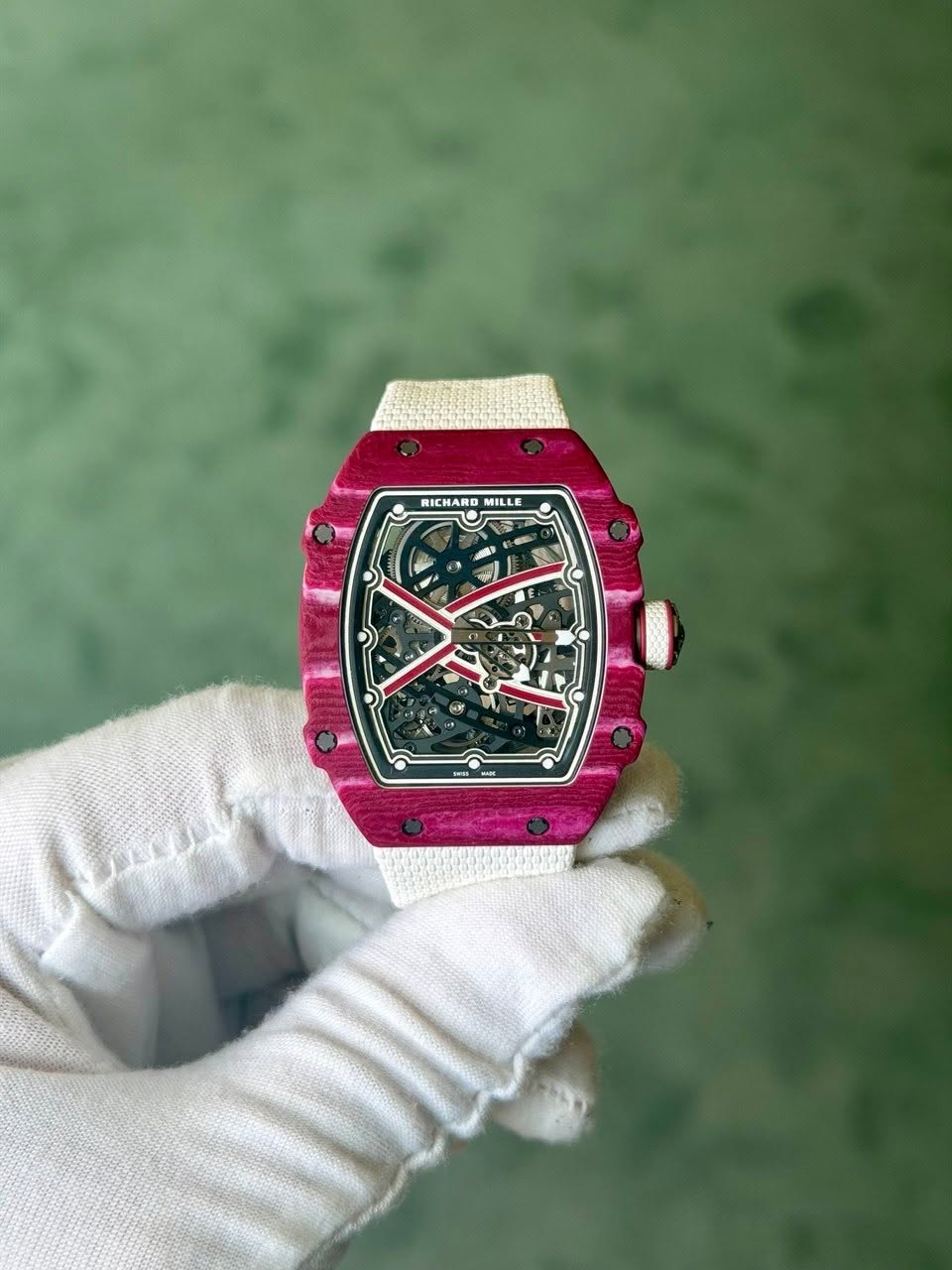 May be an image of wrist watch and text that says 'RICHARD MILLE 0 3o 9 藤 ن 3'