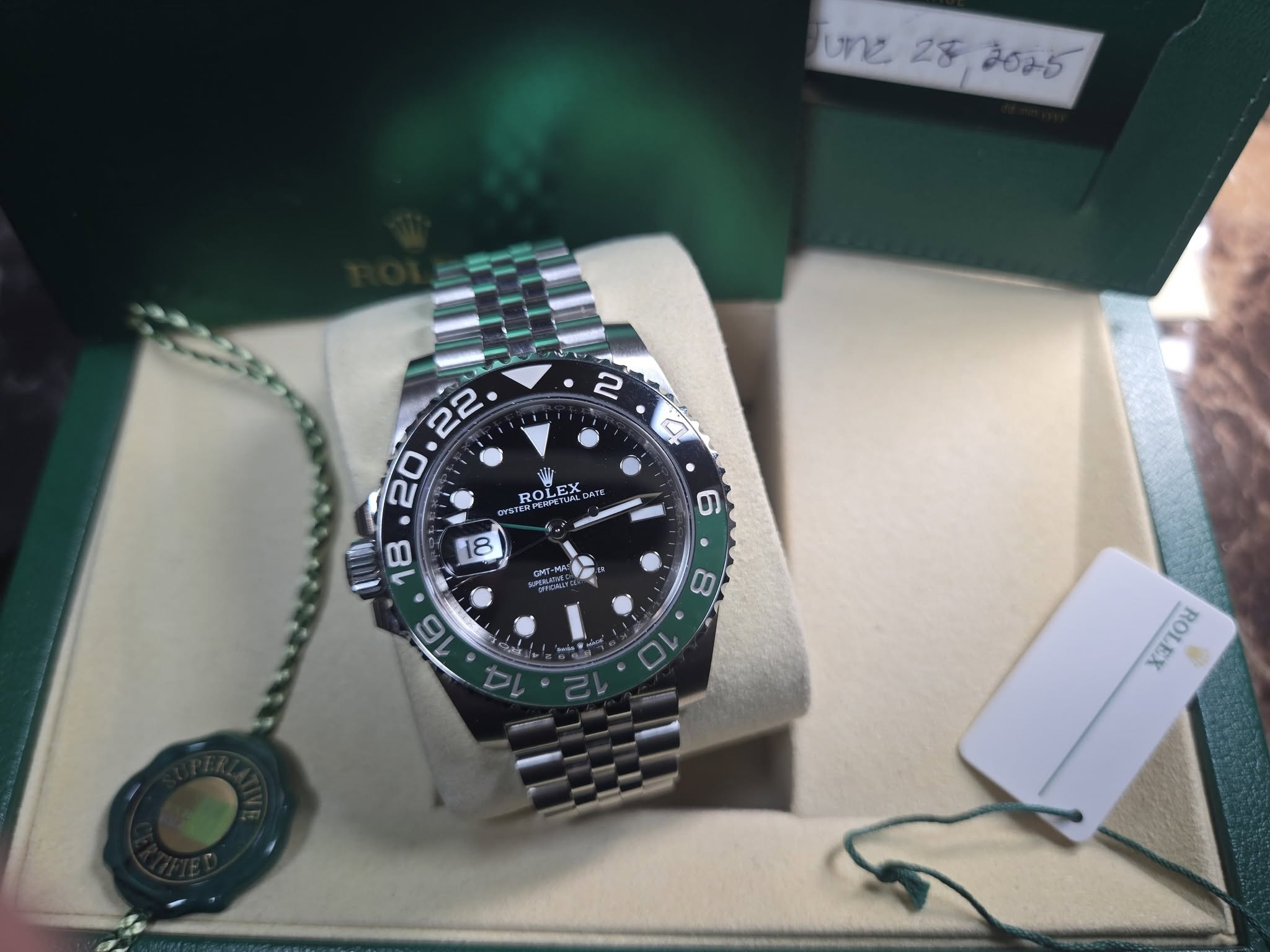May be an image of wrist watch and text