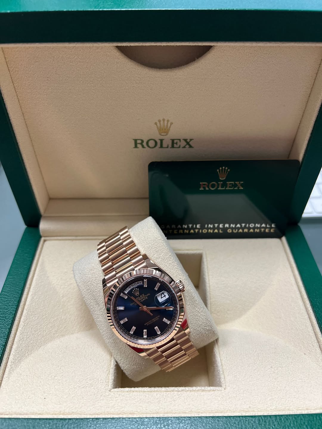 May be an image of wrist watch and text
