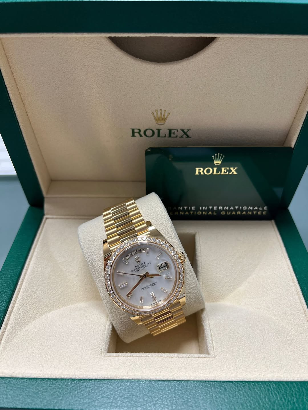 May be an image of wrist watch and text