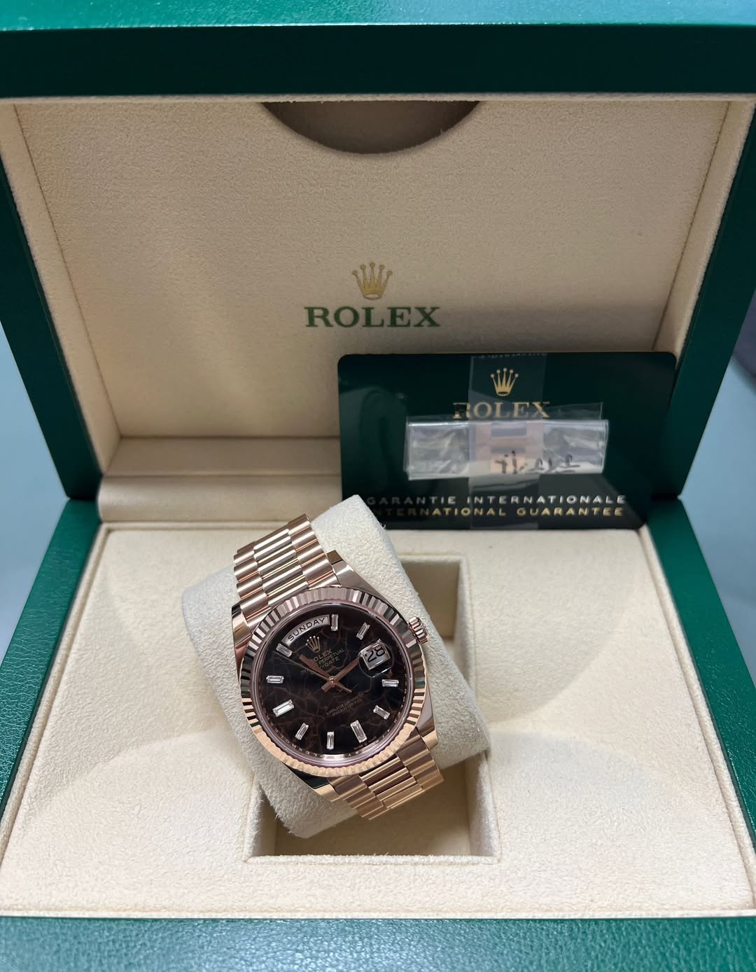 May be an image of wrist watch and text