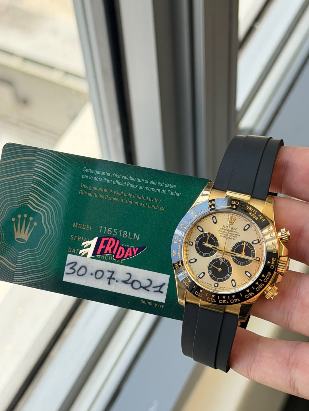 May be an image of wrist watch and text