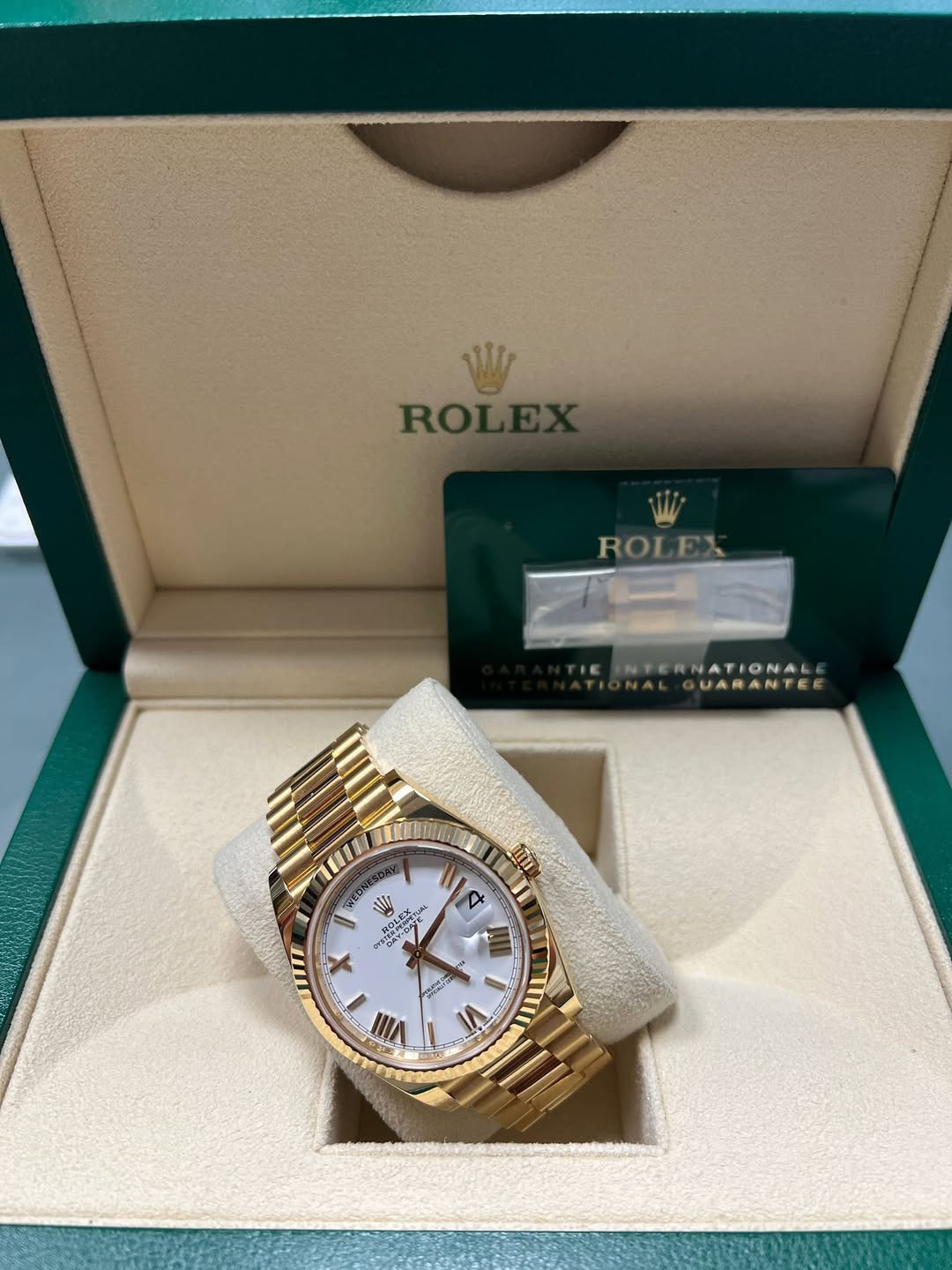 May be an image of wrist watch and text