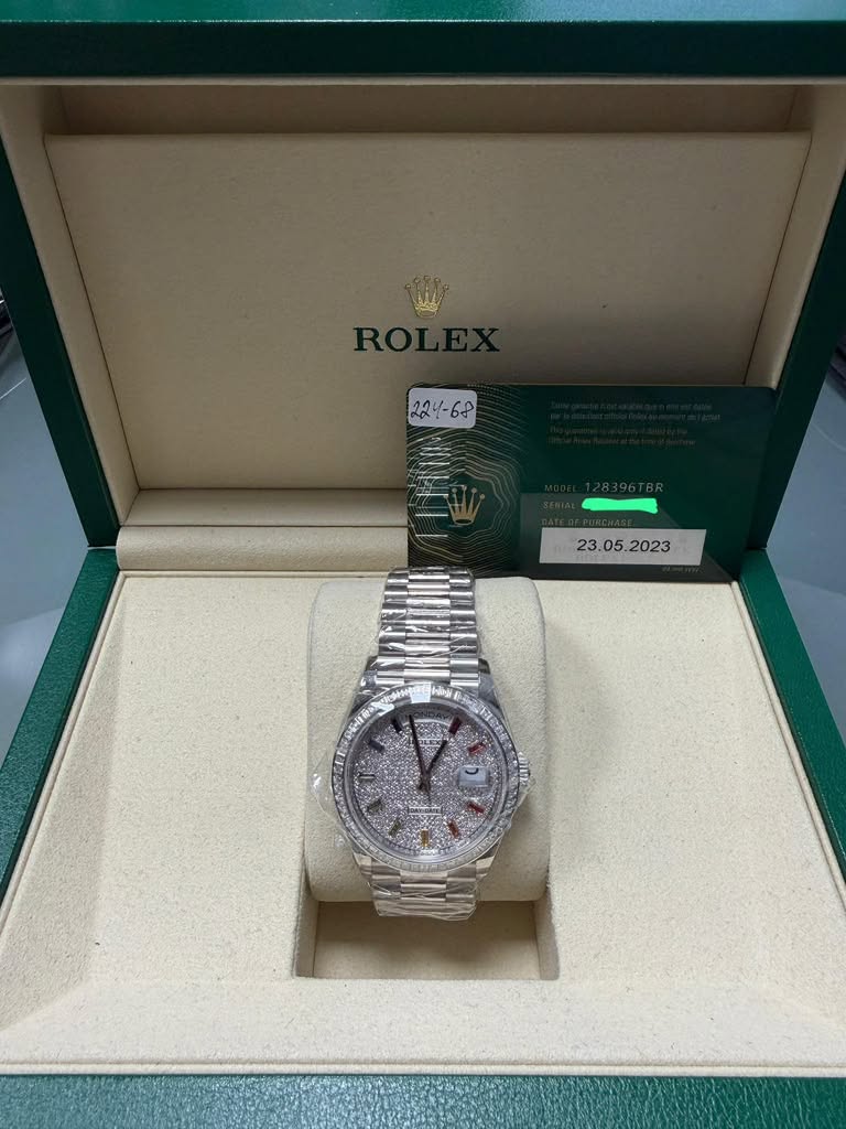 May be an image of wrist watch and text