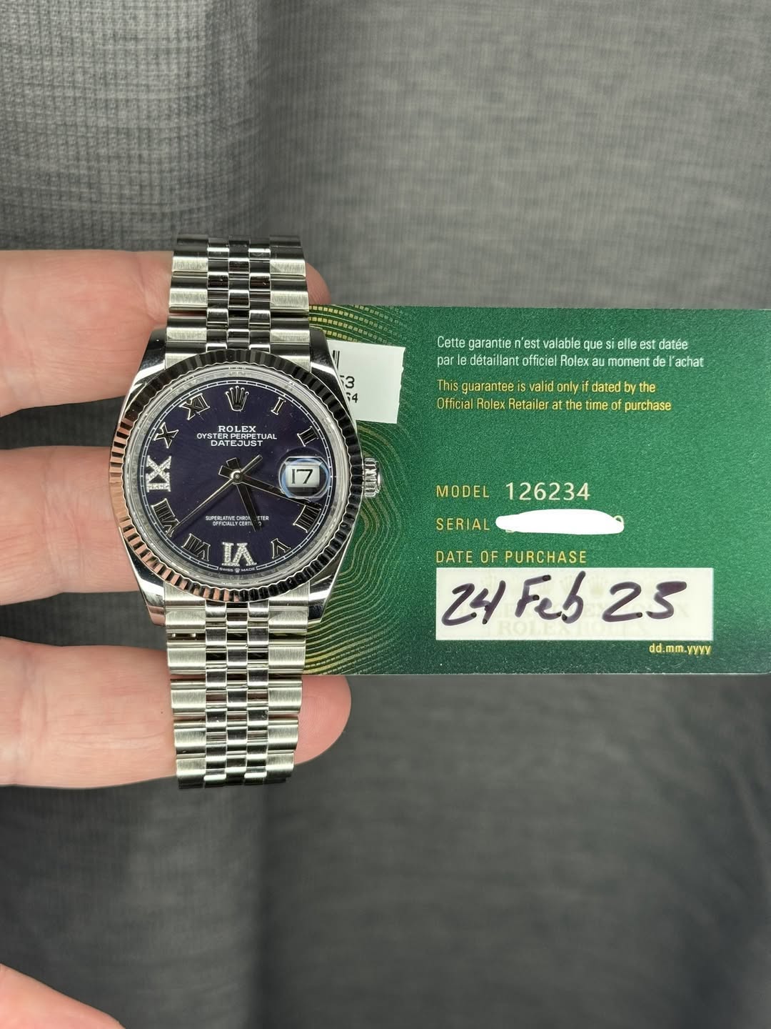 May be an image of wrist watch and text that says 'par 3 14 Cette garantie 'est valable que elle est datée detaillan llant officiel Rolex moment de achat YSTER YSTER DATES STERPER…